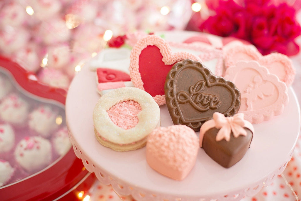 Heart shaped Valentine candy in pinks, reds, and whites with