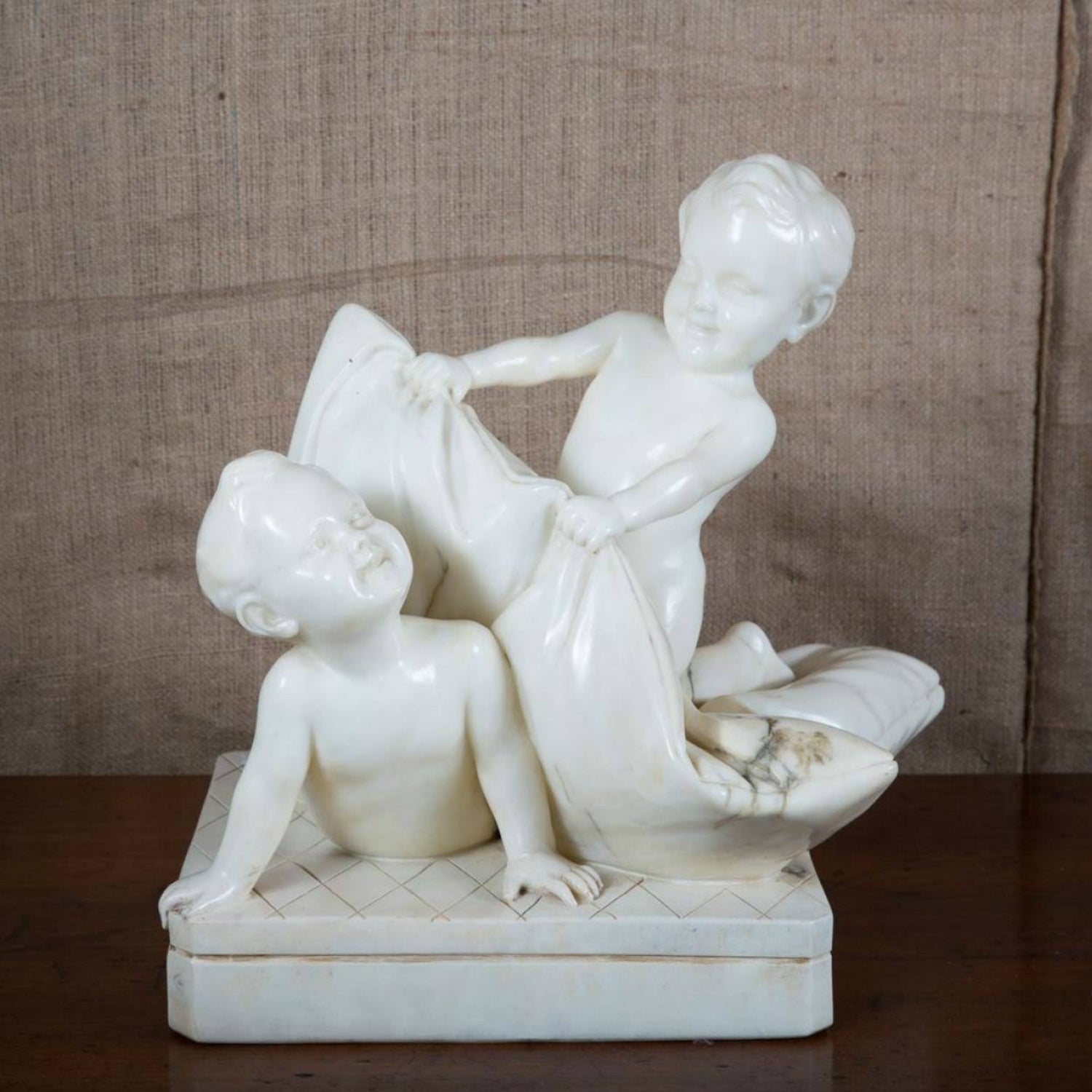 Early 20th Century Italian Carved Alabaster Sculpture of Putti Pillow Fight