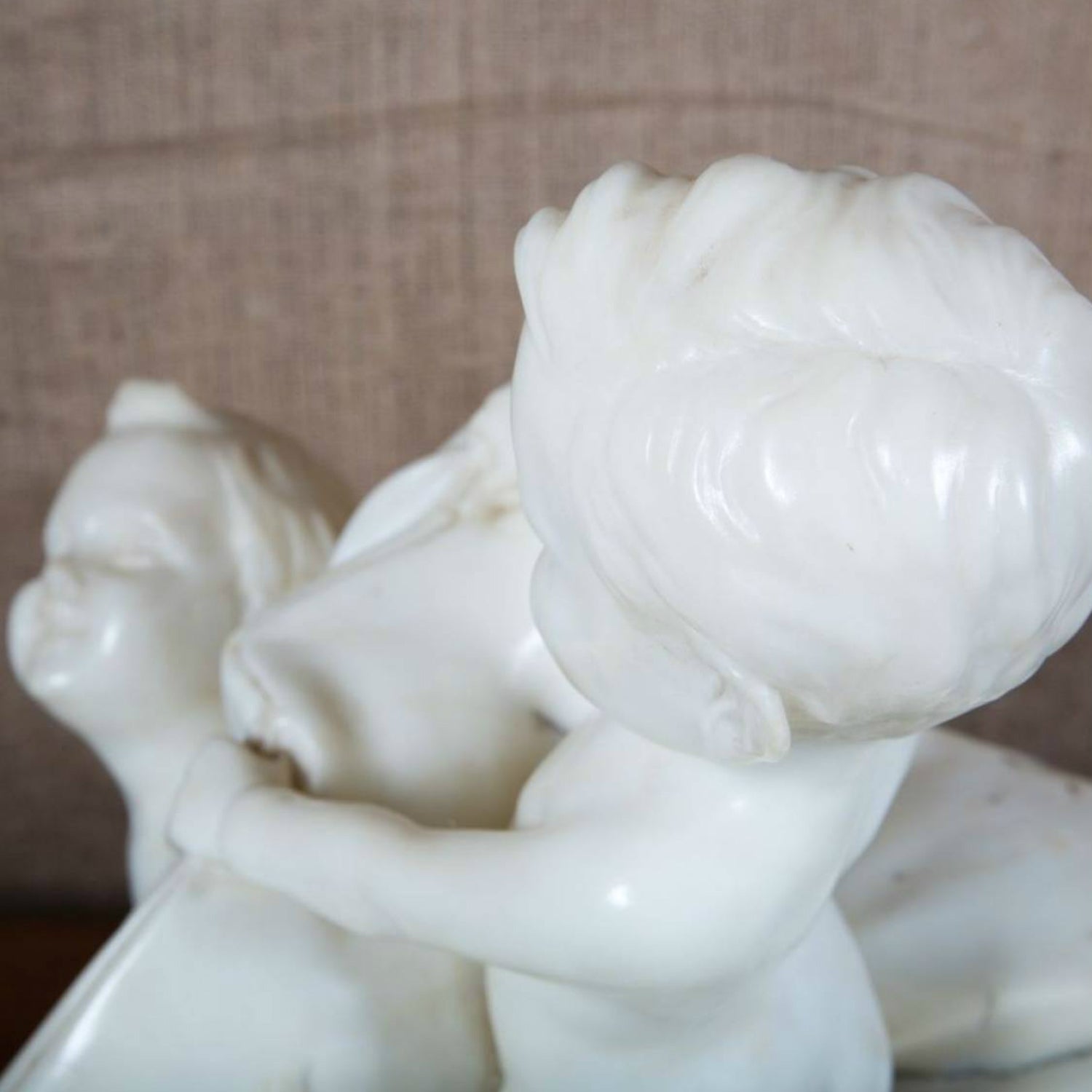 Early 20th Century Italian Carved Alabaster Sculpture of Putti Pillow Fight