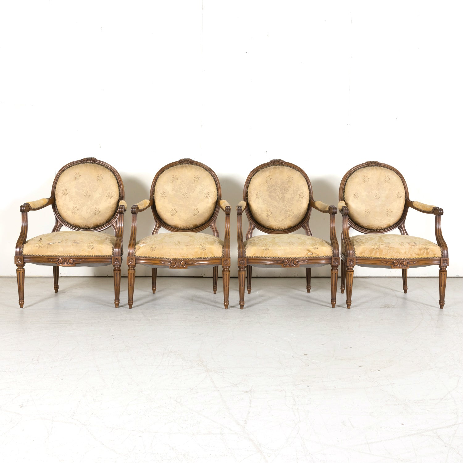 Four 19th Century French Louis XVI Style Carved Walnut Armchairs or Fauteuils a la Reine, Sold Separately