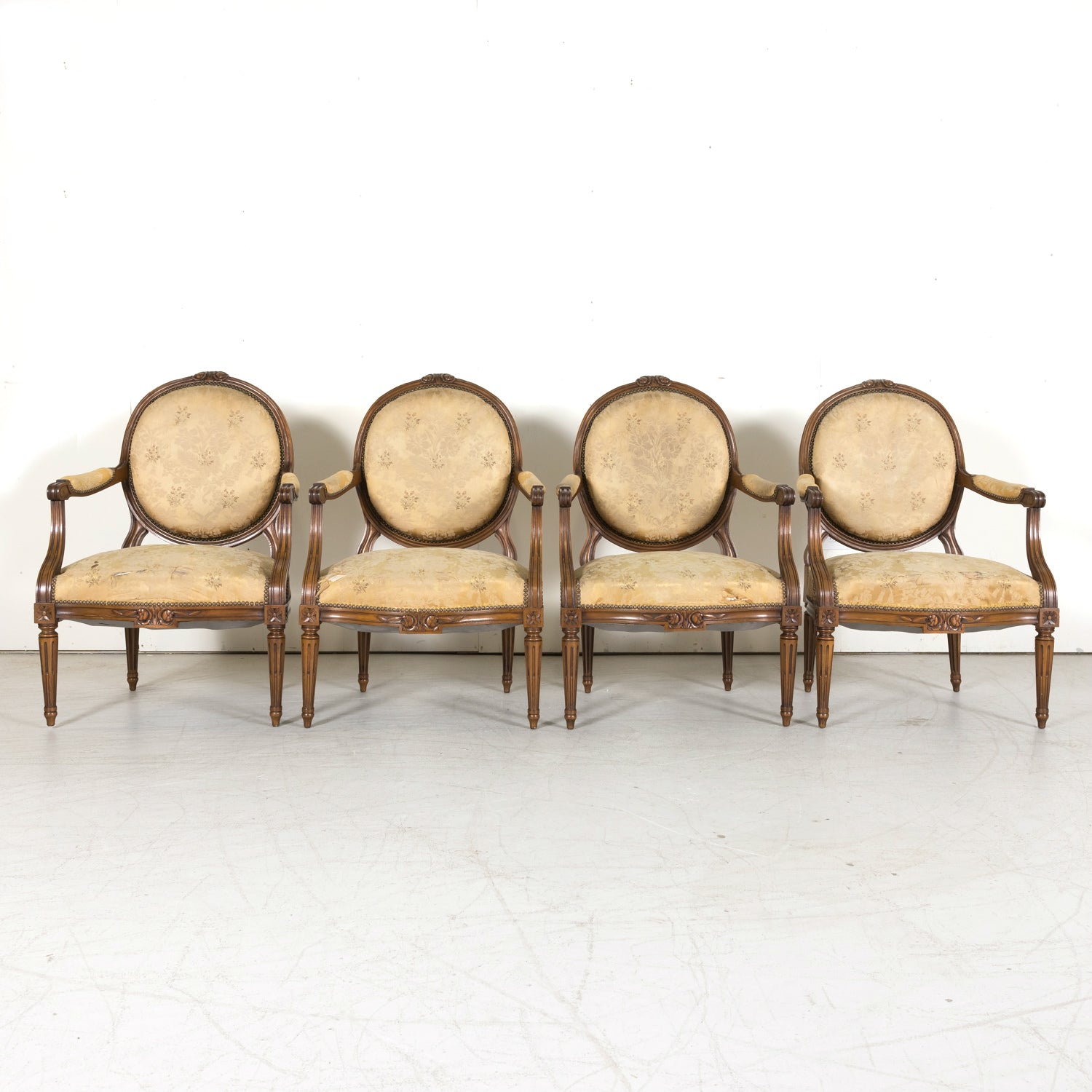Four 19th Century French Louis XVI Style Carved Walnut Armchairs or Fauteuils a la Reine, Sold Separately