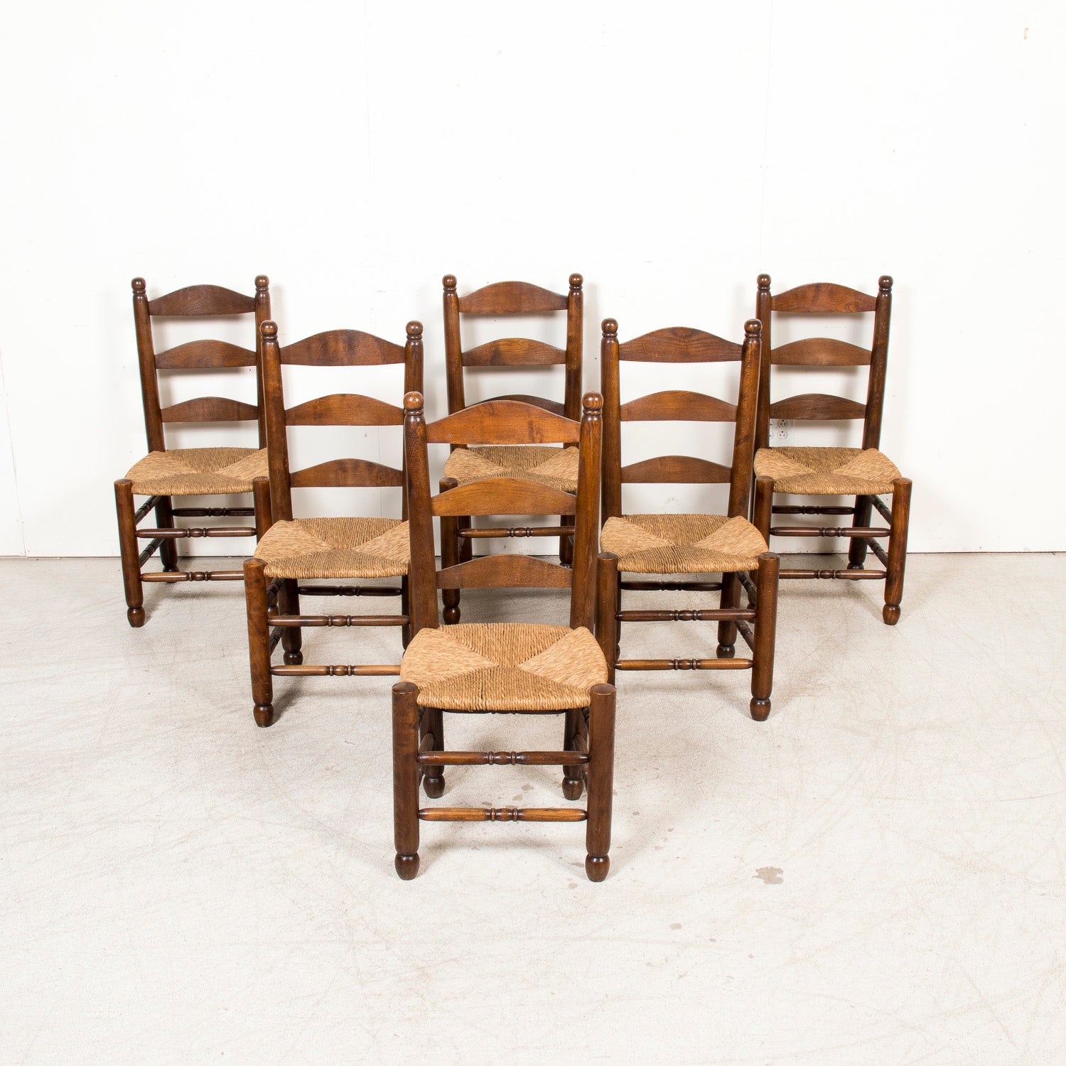 Set of Six 19th Century French Ladderback Walnut Chairs with Rush Seats From Normandy
