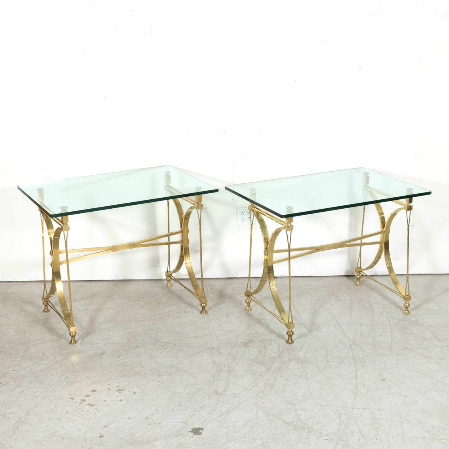Pair of Mid-20th Century French Gilt Brass and Glass Console Tables Attributed to Maison Jansen