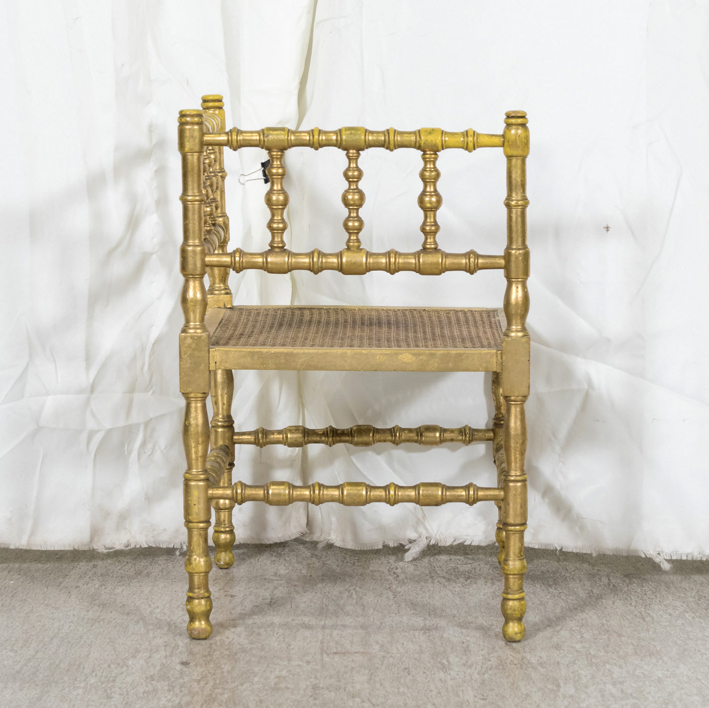 Early 20th Century French Carved Faux Bamboo Painted and Parcel Gilt Corner Chair with Cane Seat