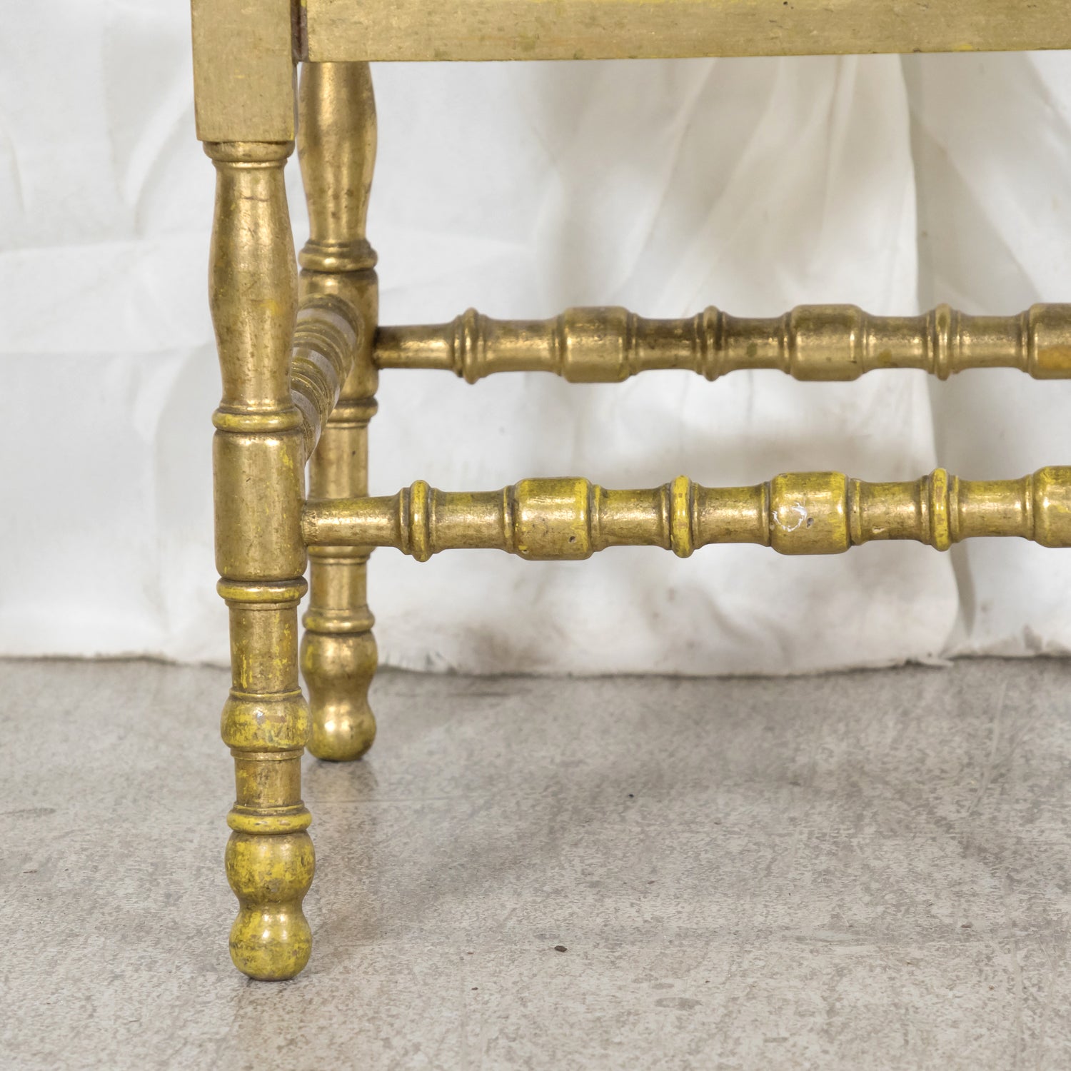 Early 20th Century French Carved Faux Bamboo Painted and Parcel Gilt Corner Chair with Cane Seat