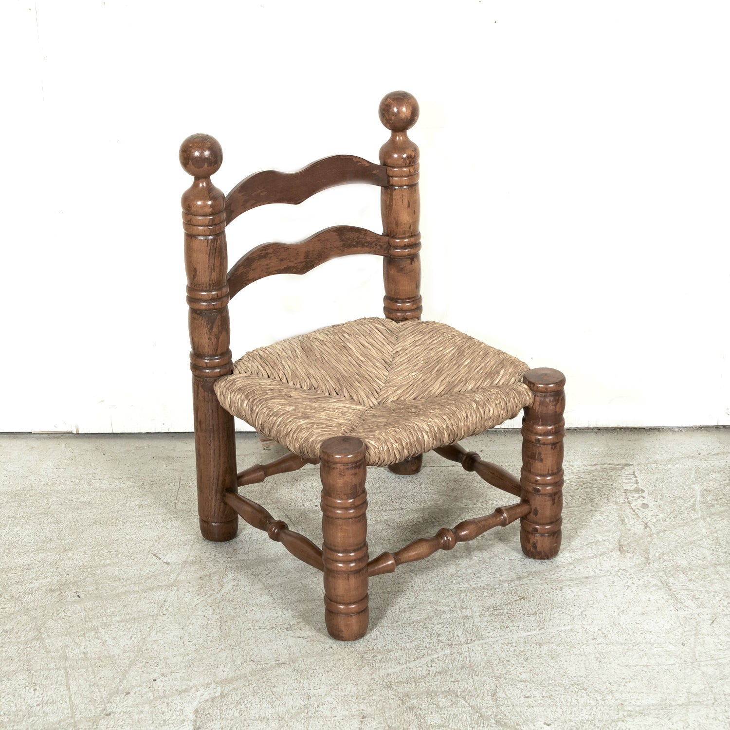 Pair of Mid-20th Century French Brutalist Style Low Rush Seat Fireplace Chairs by Charles Dudouyt