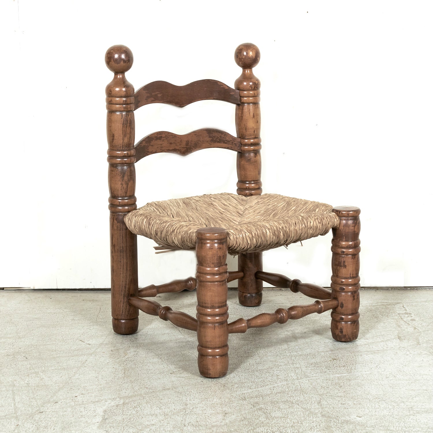 Pair of Mid-20th Century French Brutalist Style Low Rush Seat Fireplace Chairs by Charles Dudouyt