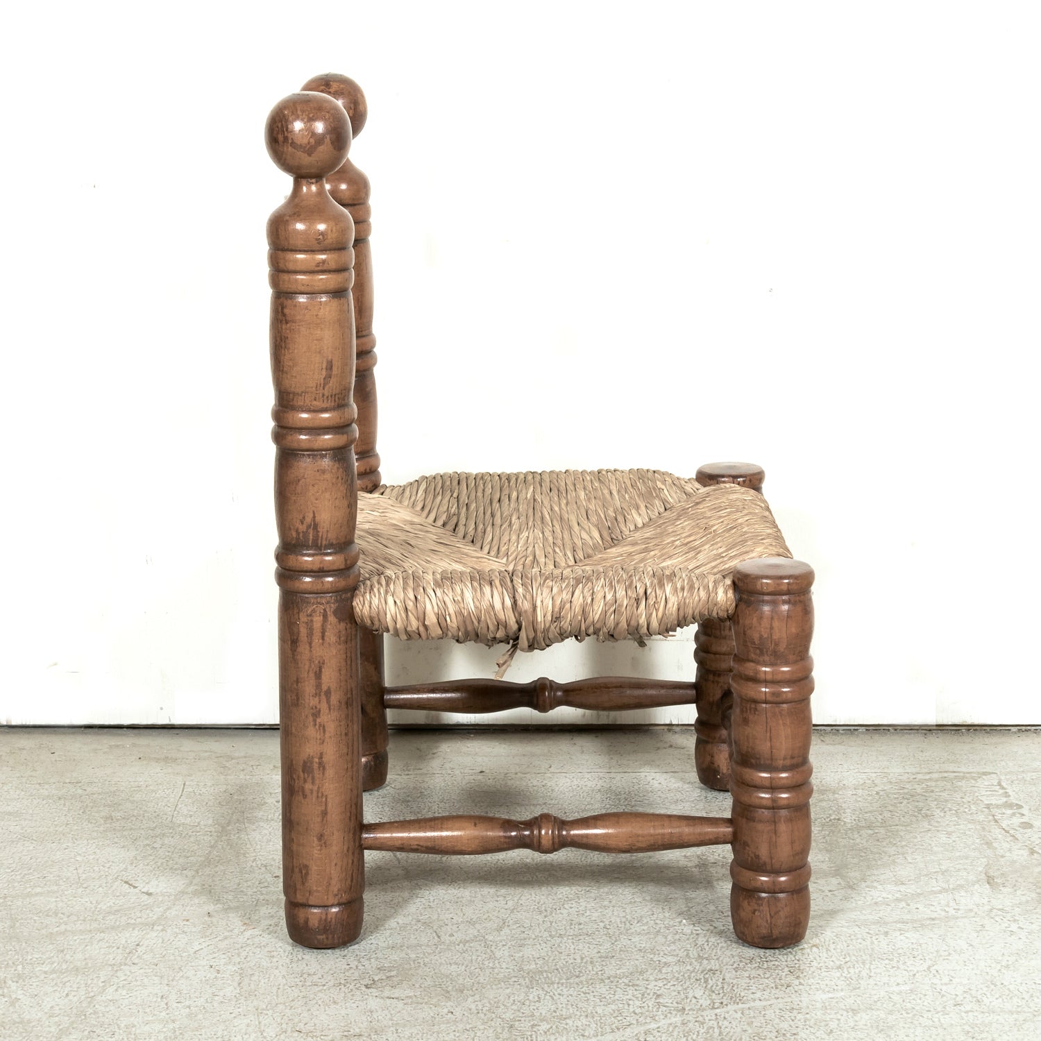 Pair of Mid-20th Century French Brutalist Style Low Rush Seat Fireplace Chairs by Charles Dudouyt