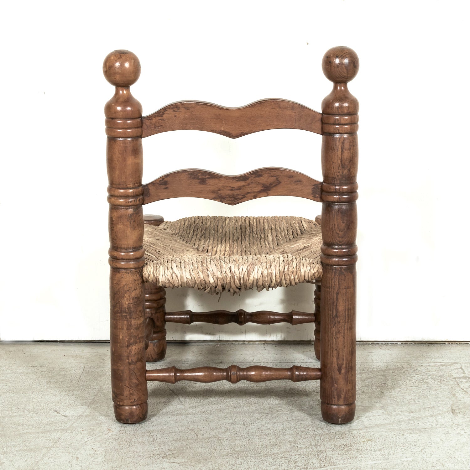 Pair of Mid-20th Century French Brutalist Style Low Rush Seat Fireplace Chairs by Charles Dudouyt