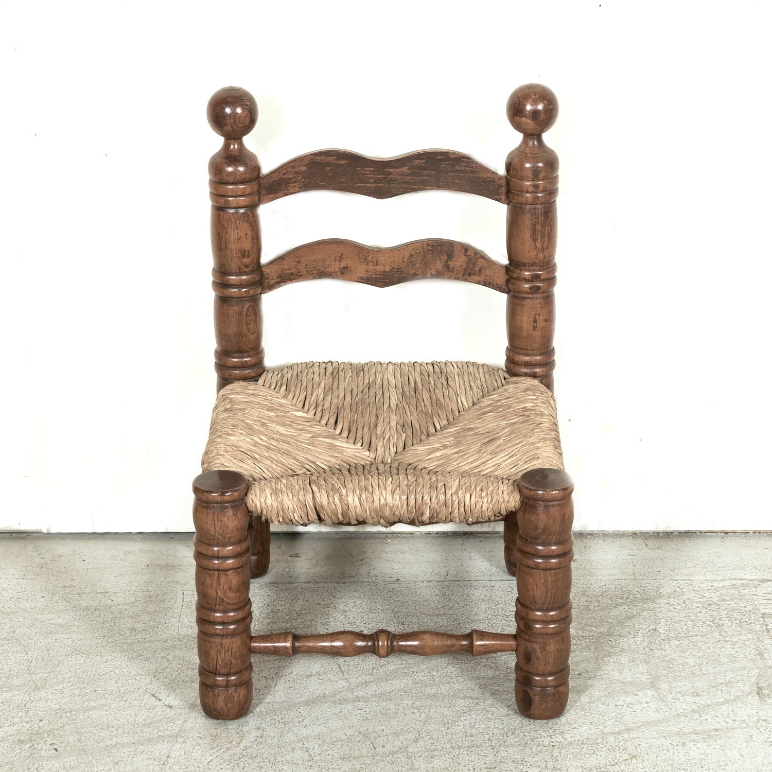 Pair of Mid-20th Century French Brutalist Style Low Rush Seat Fireplace Chairs by Charles Dudouyt