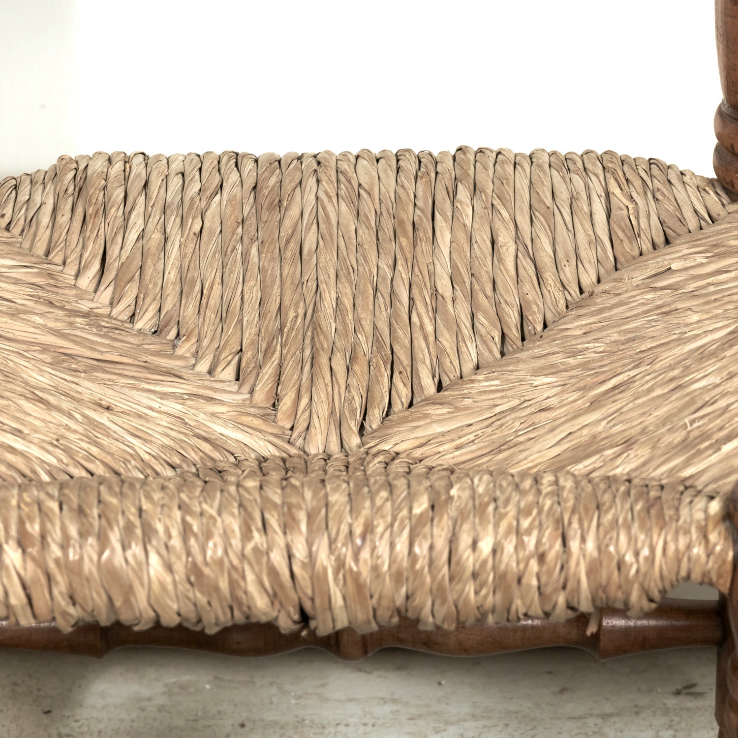 Pair of Mid-20th Century French Brutalist Style Low Rush Seat Fireplace Chairs by Charles Dudouyt