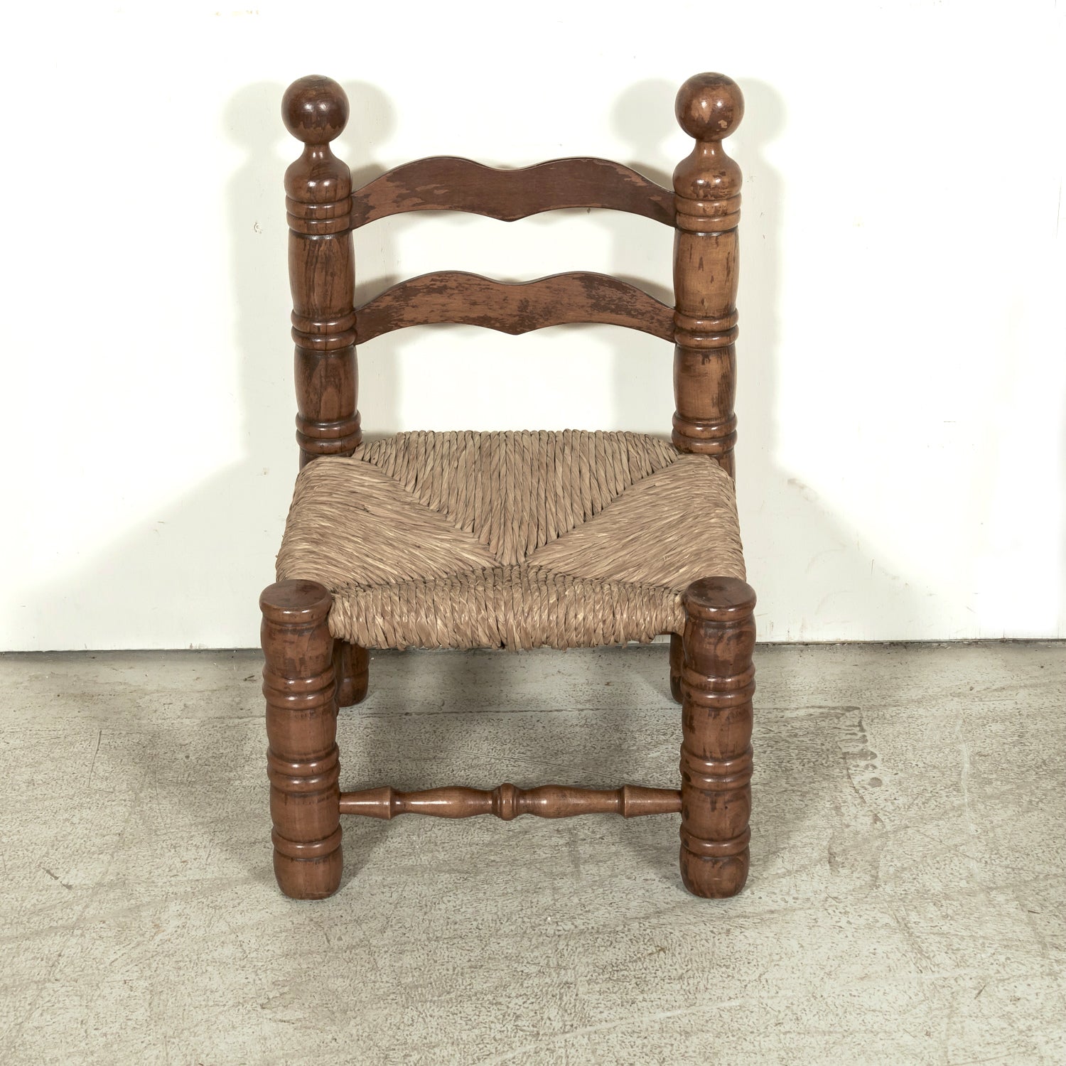 Pair of Mid-20th Century French Brutalist Style Low Rush Seat Fireplace Chairs by Charles Dudouyt