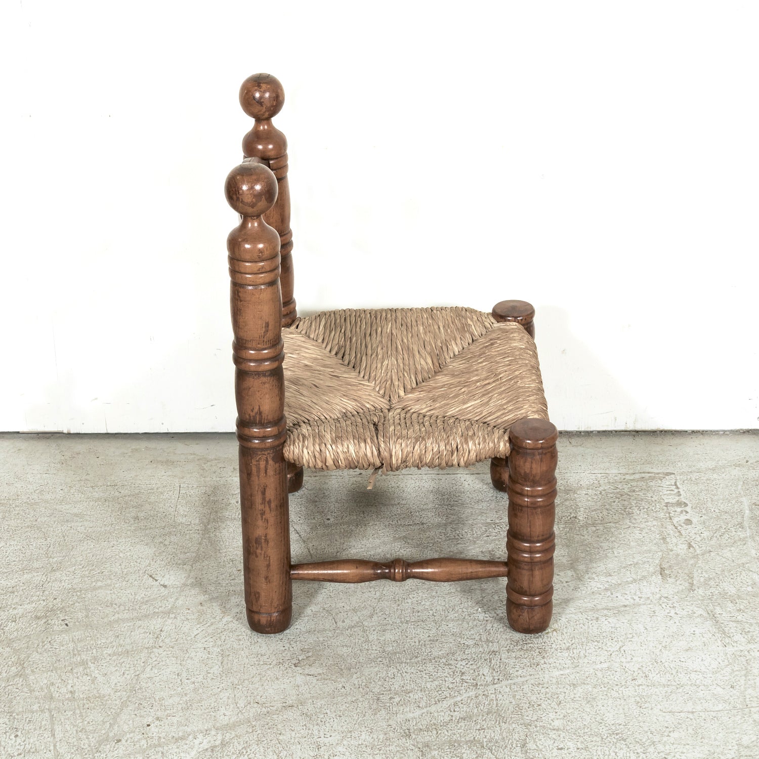 Pair of Mid-20th Century French Brutalist Style Low Rush Seat Fireplace Chairs by Charles Dudouyt