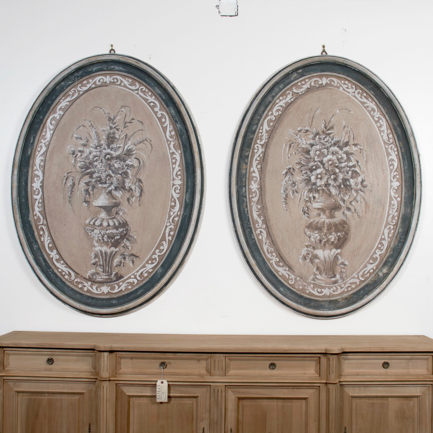 Large Pair of Italian Hand Painted Floral Still Lifes in Carved Painted Oval Frames