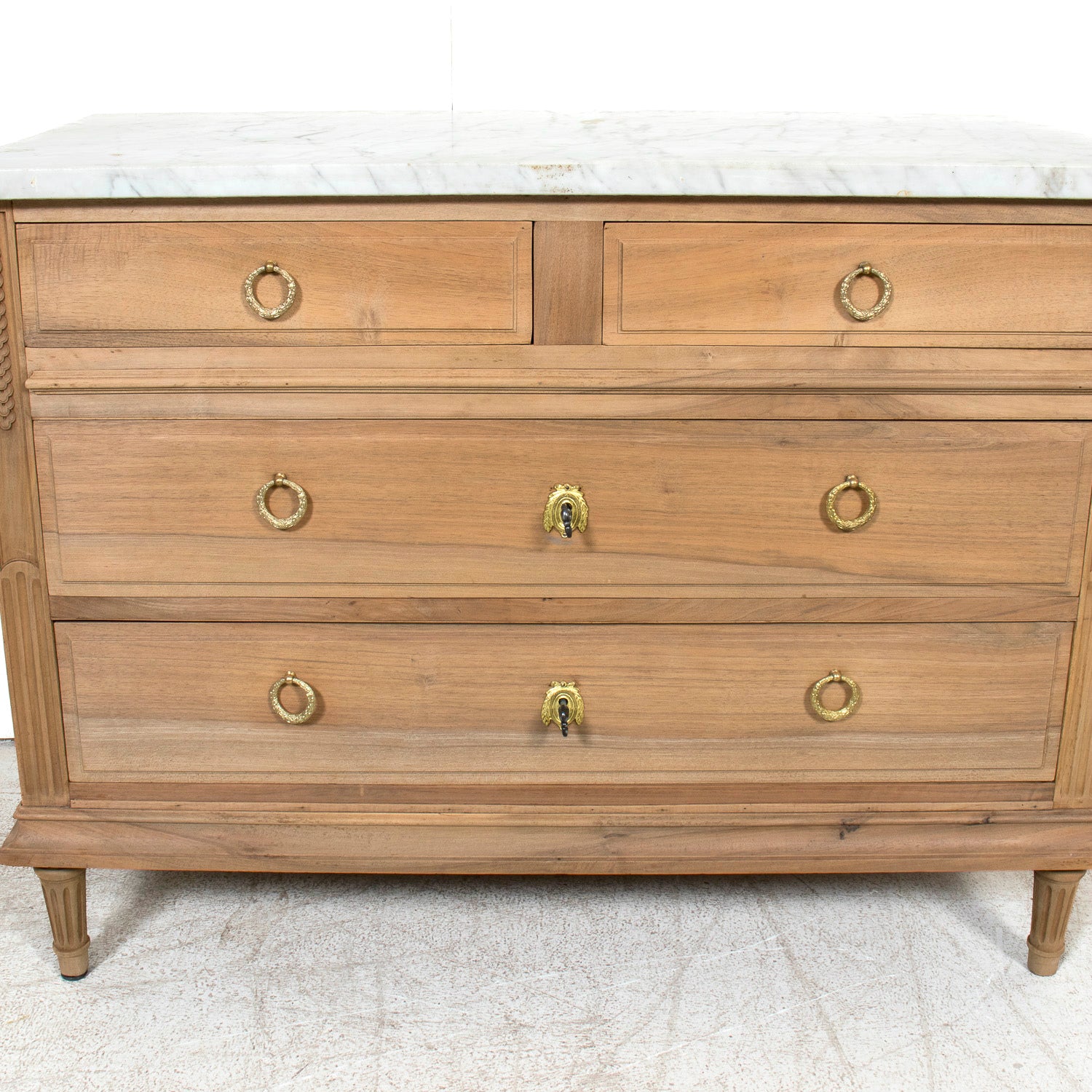 Early 20th Century French Louis XVI Style Bleached Walnut Four-Drawer Commode with Carrara Marble Top