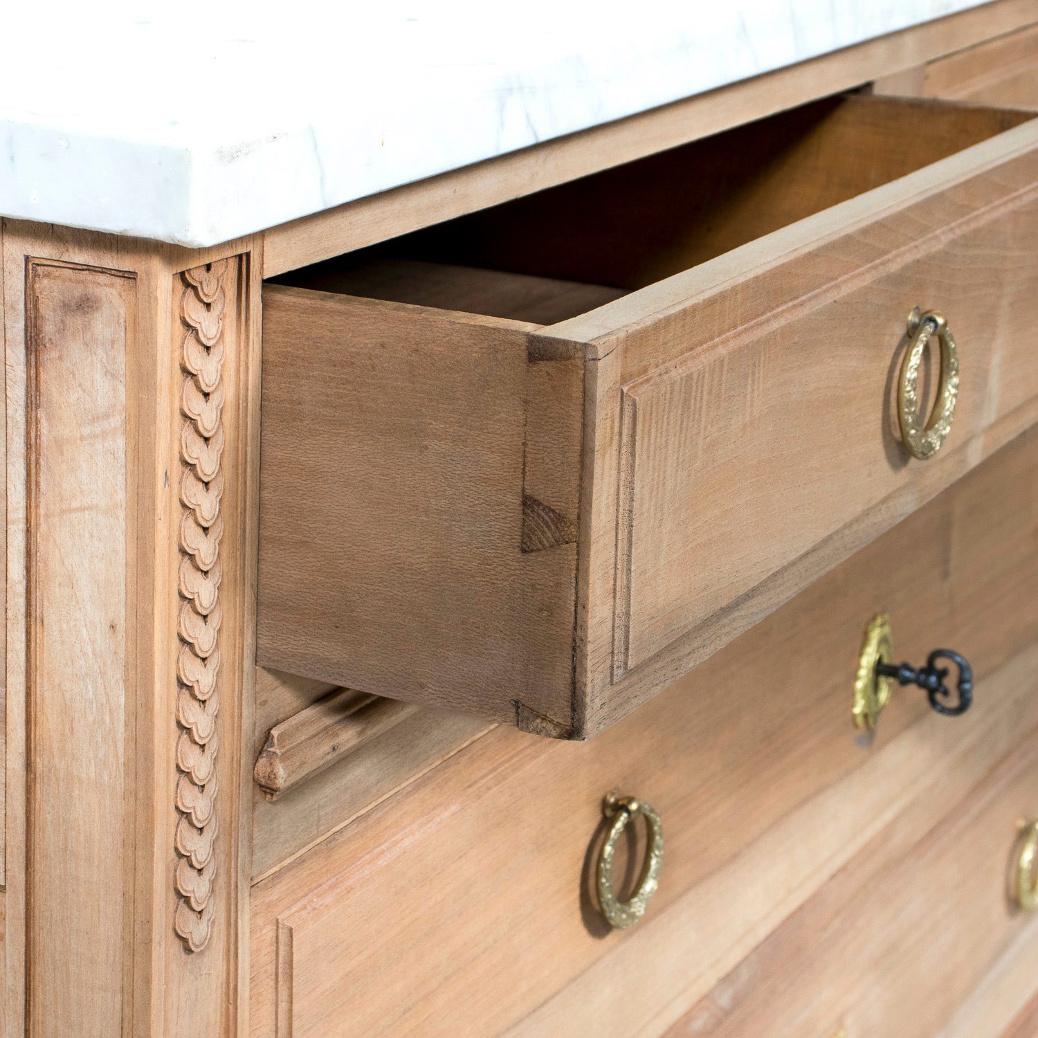 Early 20th Century French Louis XVI Style Bleached Walnut Four-Drawer Commode with Carrara Marble Top