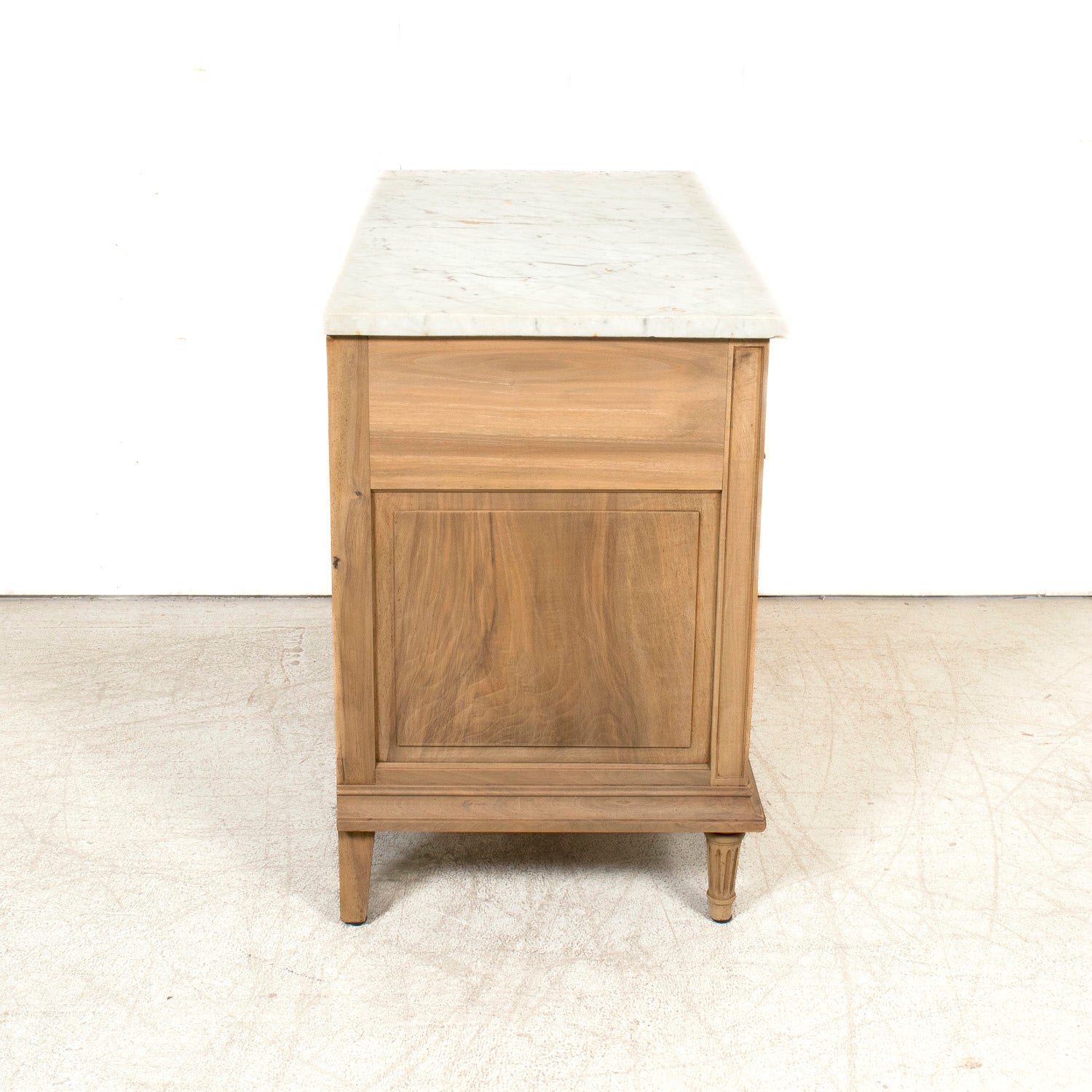 Early 20th Century French Louis XVI Style Bleached Walnut Four-Drawer Commode with Carrara Marble Top