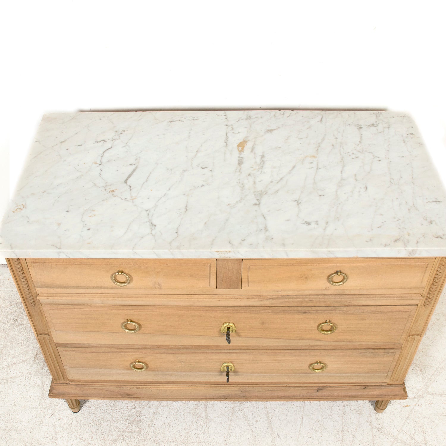 Early 20th Century French Louis XVI Style Bleached Walnut Four-Drawer Commode with Carrara Marble Top