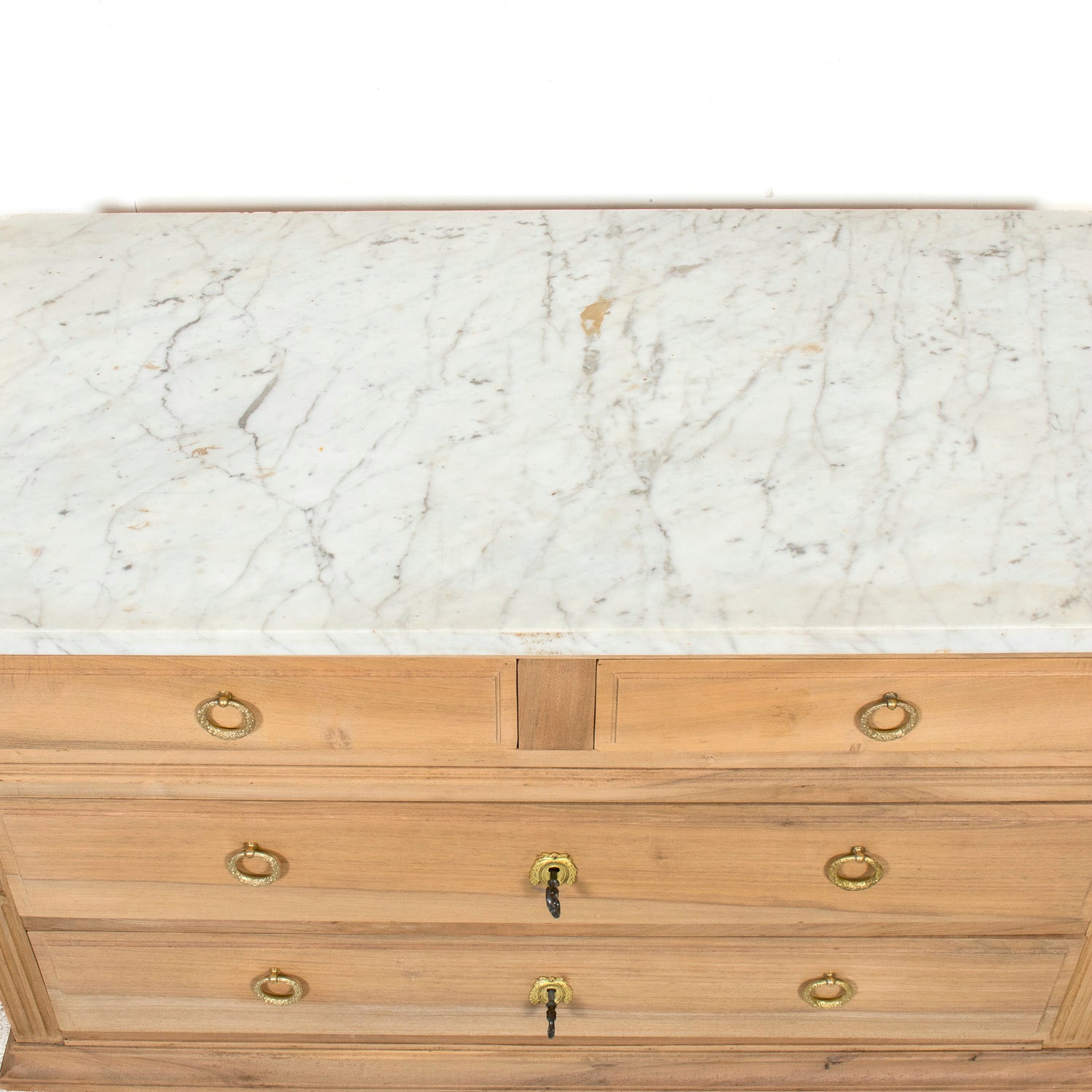 Early 20th Century French Louis XVI Style Bleached Walnut Four-Drawer Commode with Carrara Marble Top