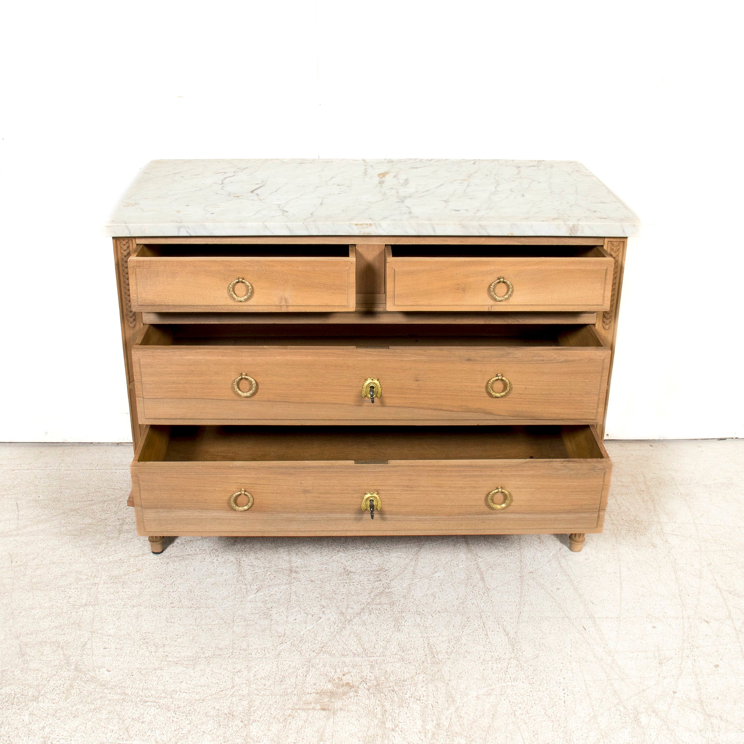 Early 20th Century French Louis XVI Style Bleached Walnut Four-Drawer Commode with Carrara Marble Top
