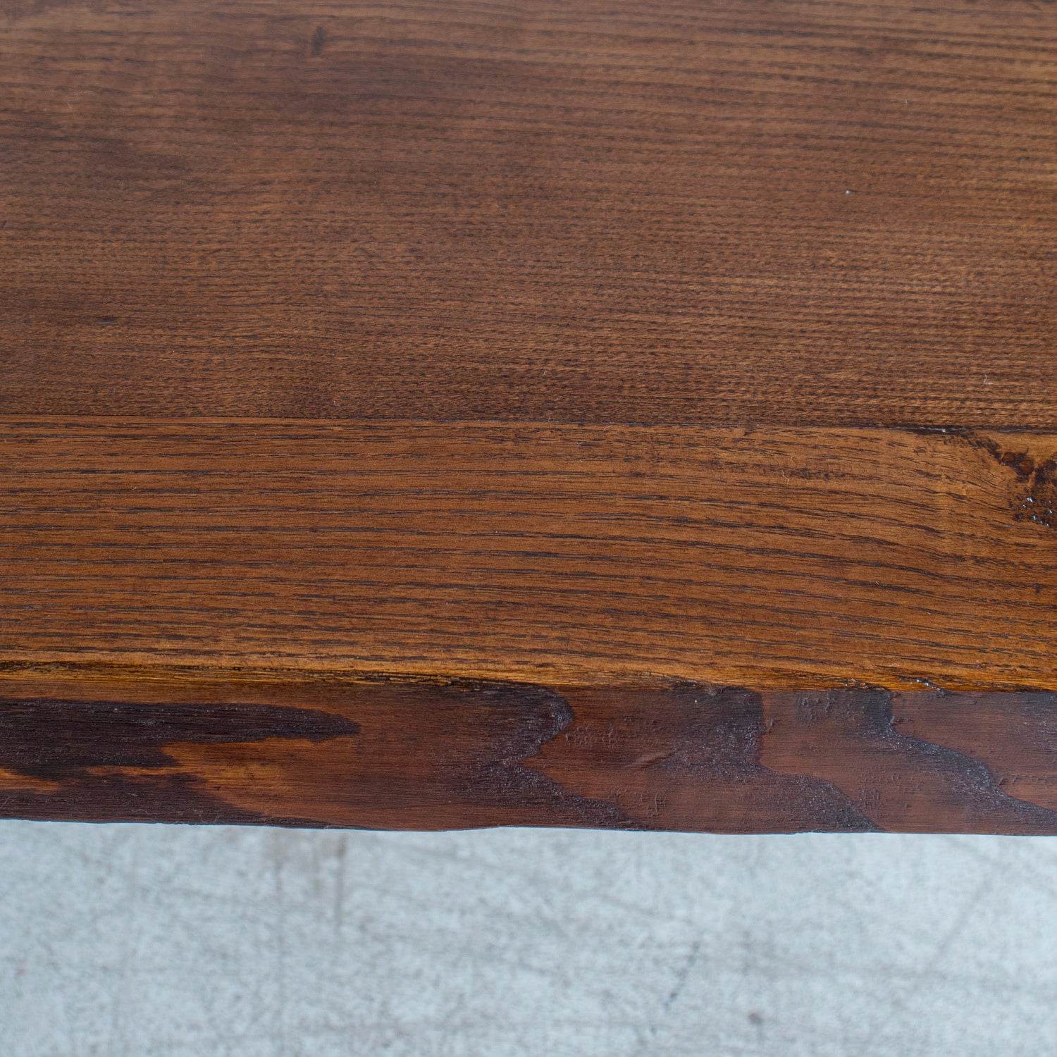 Mid-19th Century Spanish Catalan Carved Oak Dining Trestle Table with Hand Forged Iron Stretcher