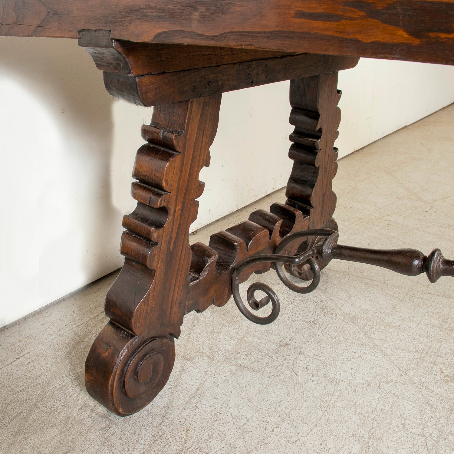 Mid-19th Century Spanish Catalan Carved Oak Dining Trestle Table with Hand Forged Iron Stretcher
