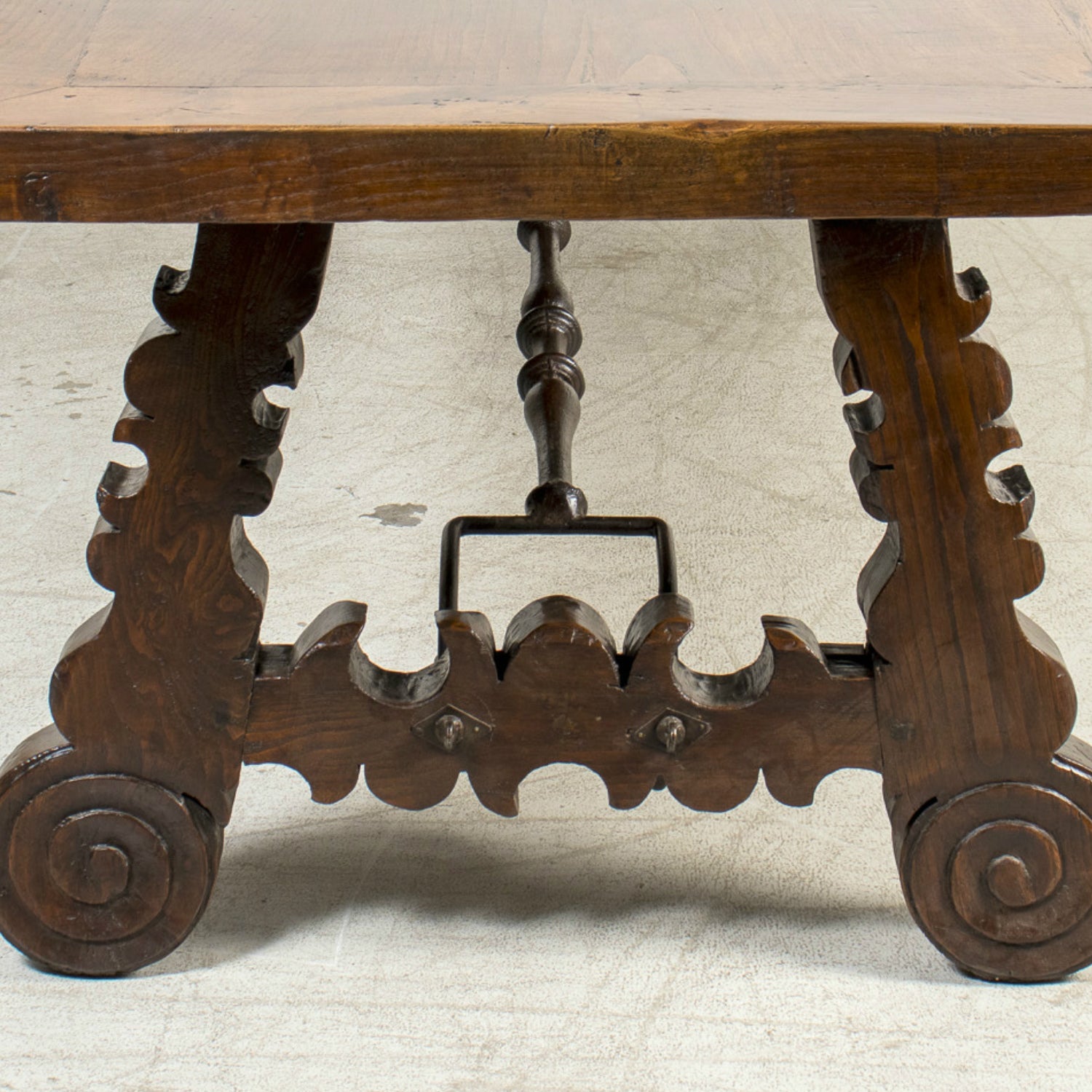 Mid-19th Century Spanish Catalan Carved Oak Dining Trestle Table with Hand Forged Iron Stretcher