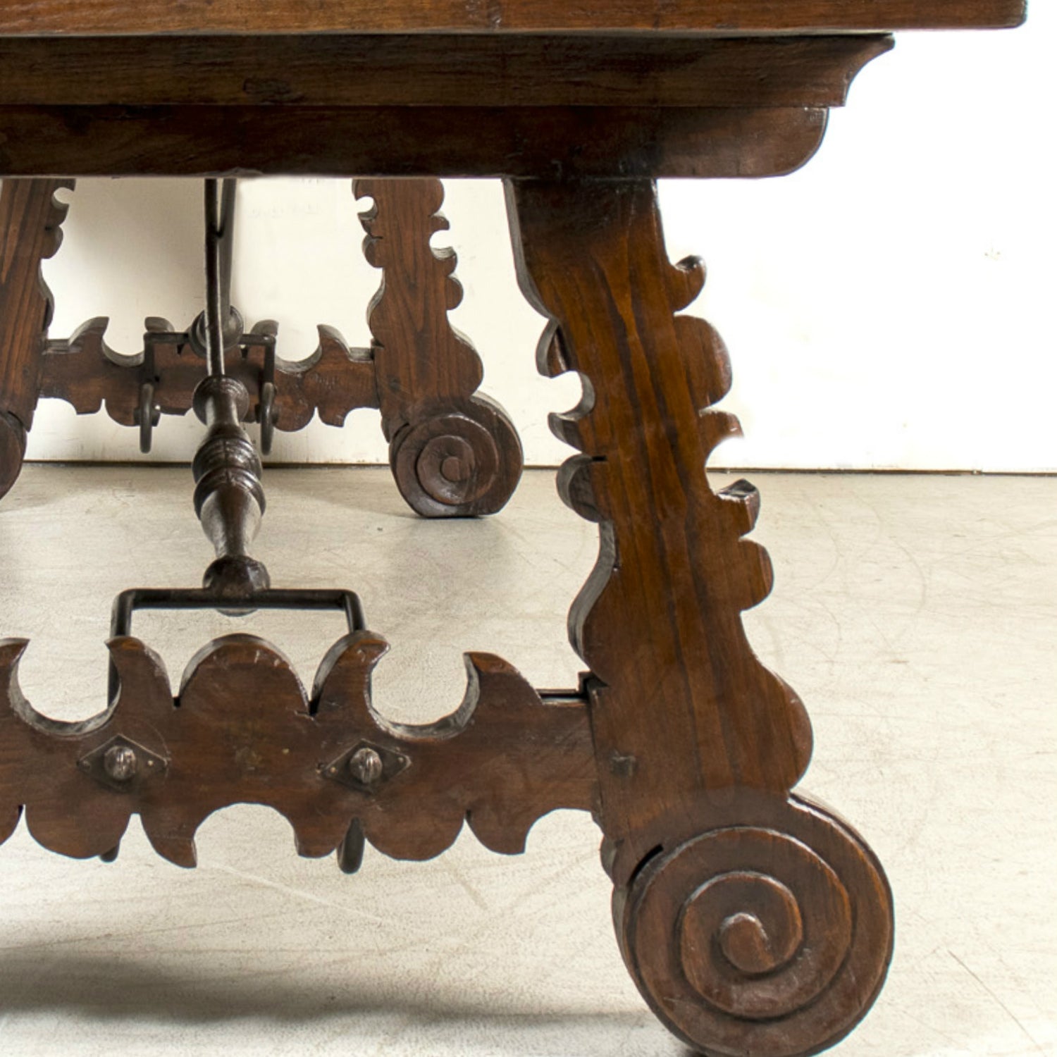Mid-19th Century Spanish Catalan Carved Oak Dining Trestle Table with Hand Forged Iron Stretcher