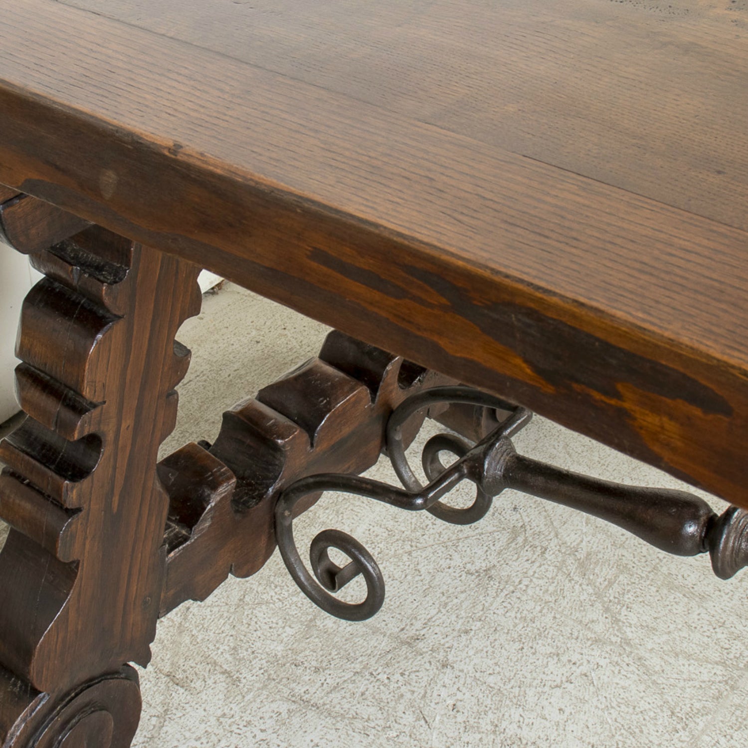 Mid-19th Century Spanish Catalan Carved Oak Dining Trestle Table with Hand Forged Iron Stretcher