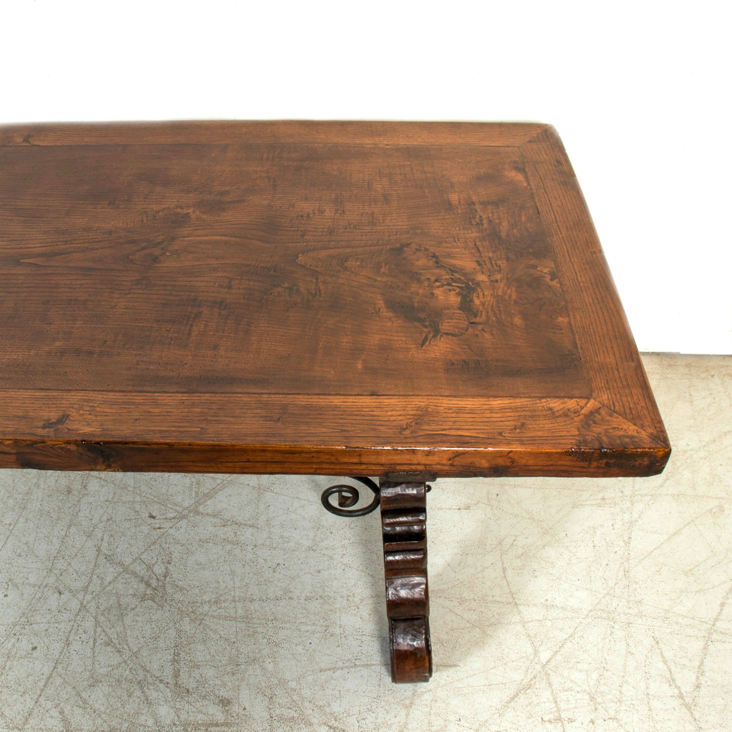 Mid-19th Century Spanish Catalan Carved Oak Dining Trestle Table with Hand Forged Iron Stretcher