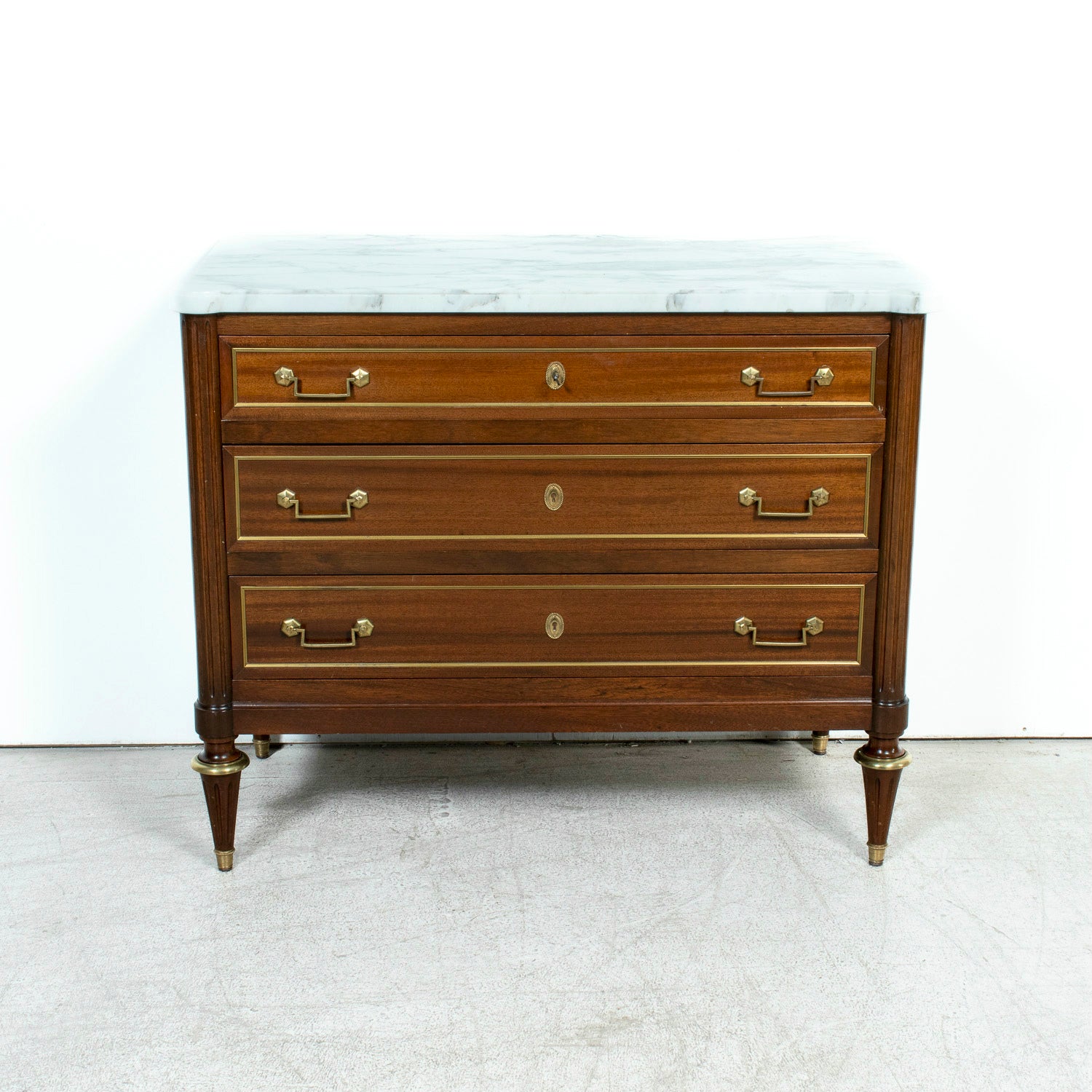 20th Century French Louis XVI Style Maison Jansen Three-Drawer Mahogany Commode with Cararra Marble Top