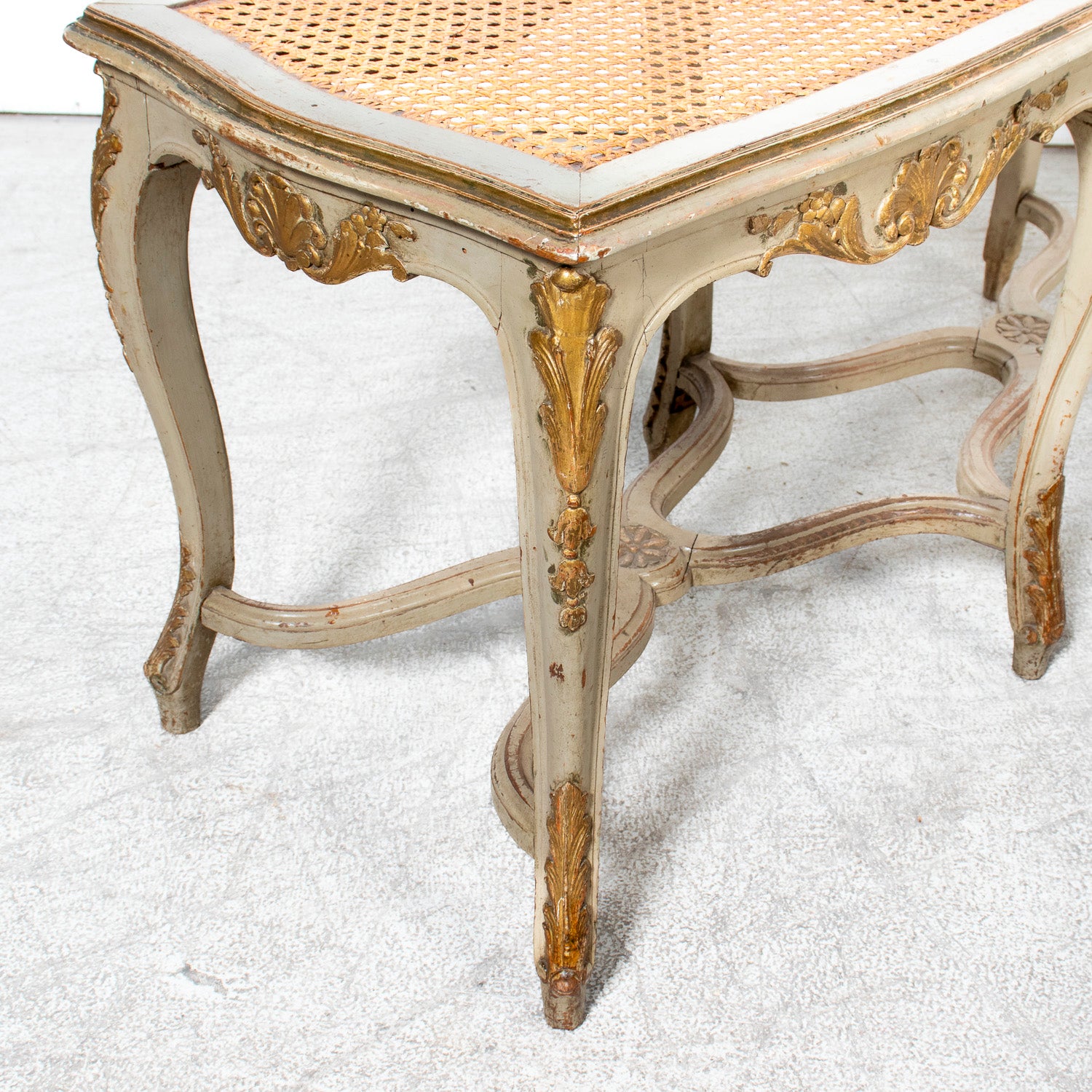 19th Century French Louis XV Style Painted and Parcel Gilt Cane Bench