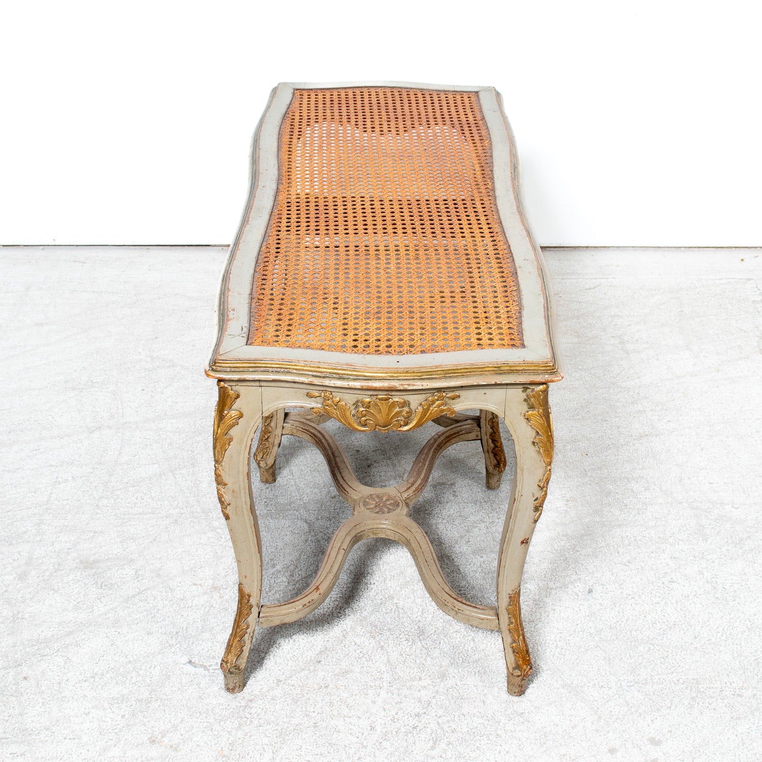 19th Century French Louis XV Style Painted and Parcel Gilt Cane Bench