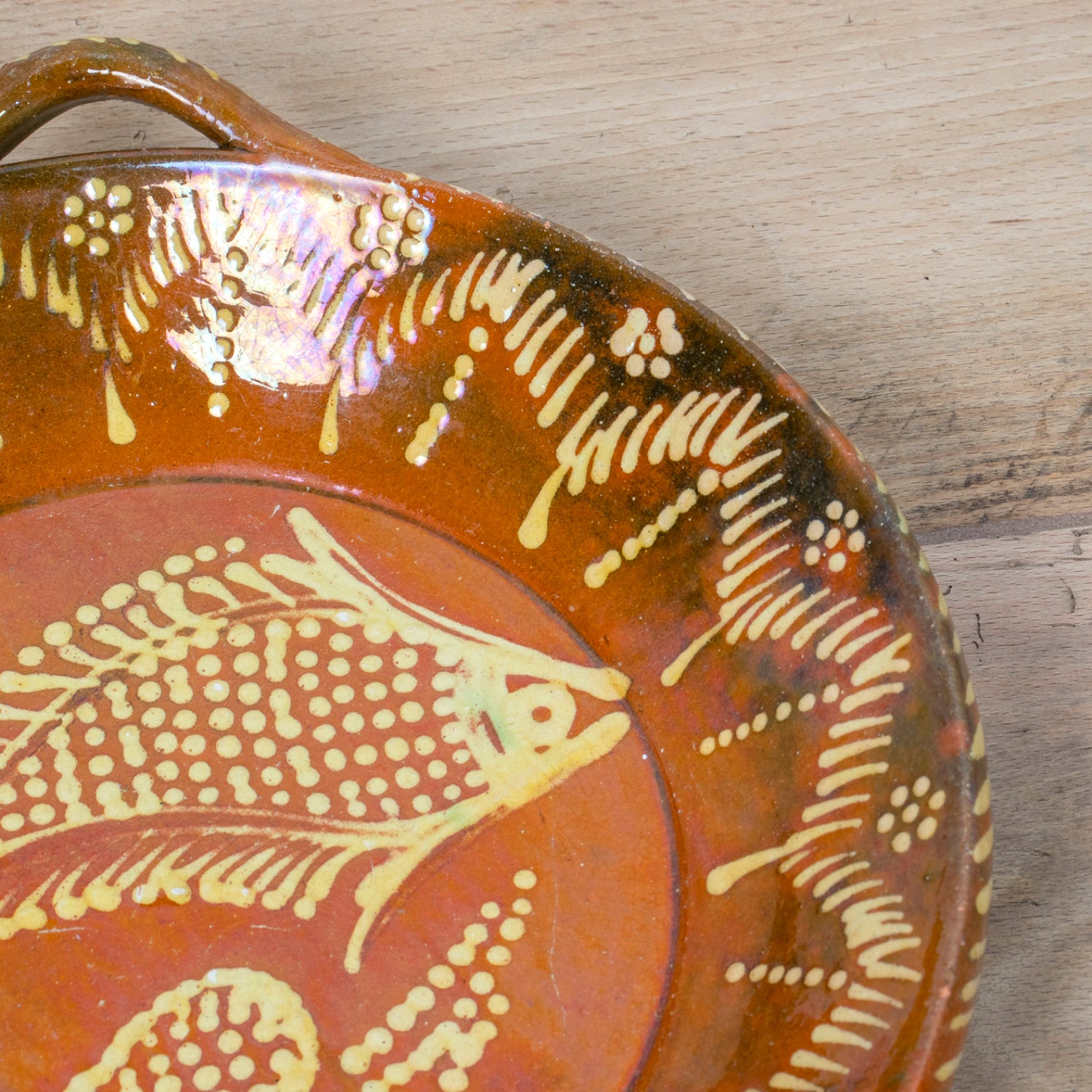 19th Century Portuguese Red Slipware Round Serving Dish with Fish and Leaf Motifs