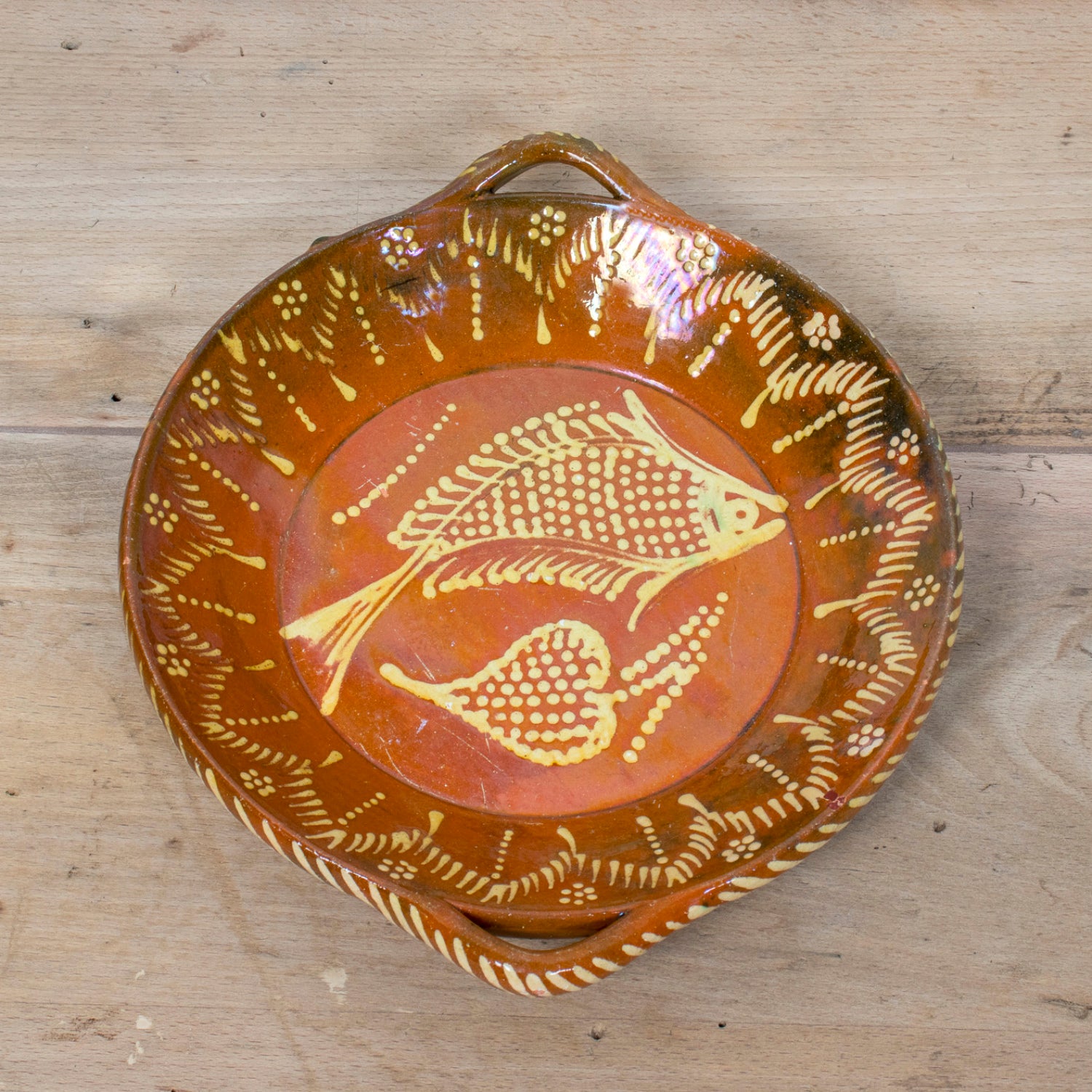 19th Century Portuguese Red Slipware Round Serving Dish with Fish and Leaf Motifs
