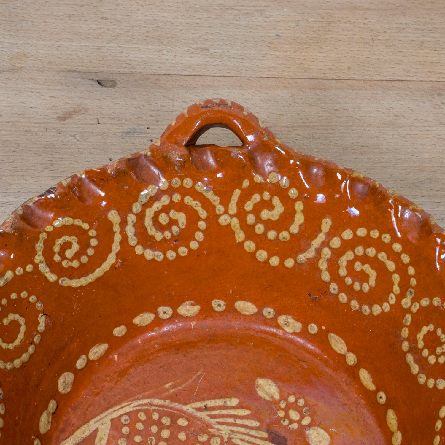 19th Century Portuguese Red Slipware Bowl with Fish Motif and Ruffled Rim