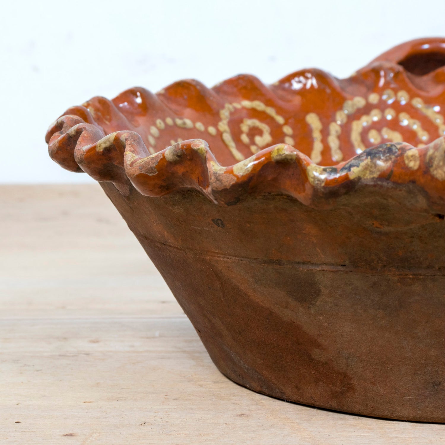 19th Century Portuguese Red Slipware Bowl with Fish Motif and Ruffled Rim