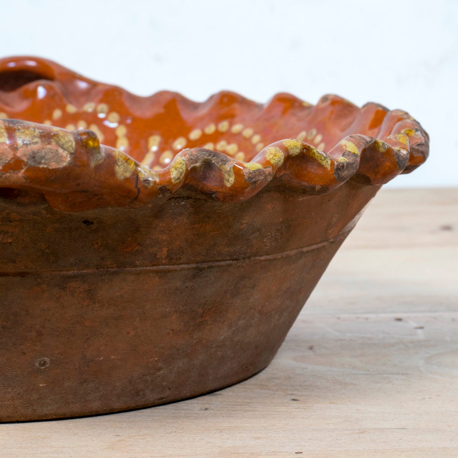 19th Century Portuguese Red Slipware Bowl with Fish Motif and Ruffled Rim