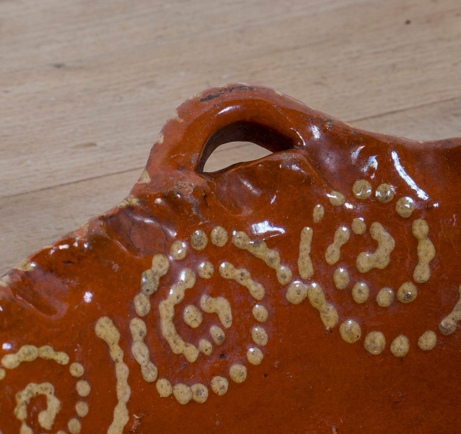 19th Century Portuguese Red Slipware Bowl with Fish Motif and Ruffled Rim