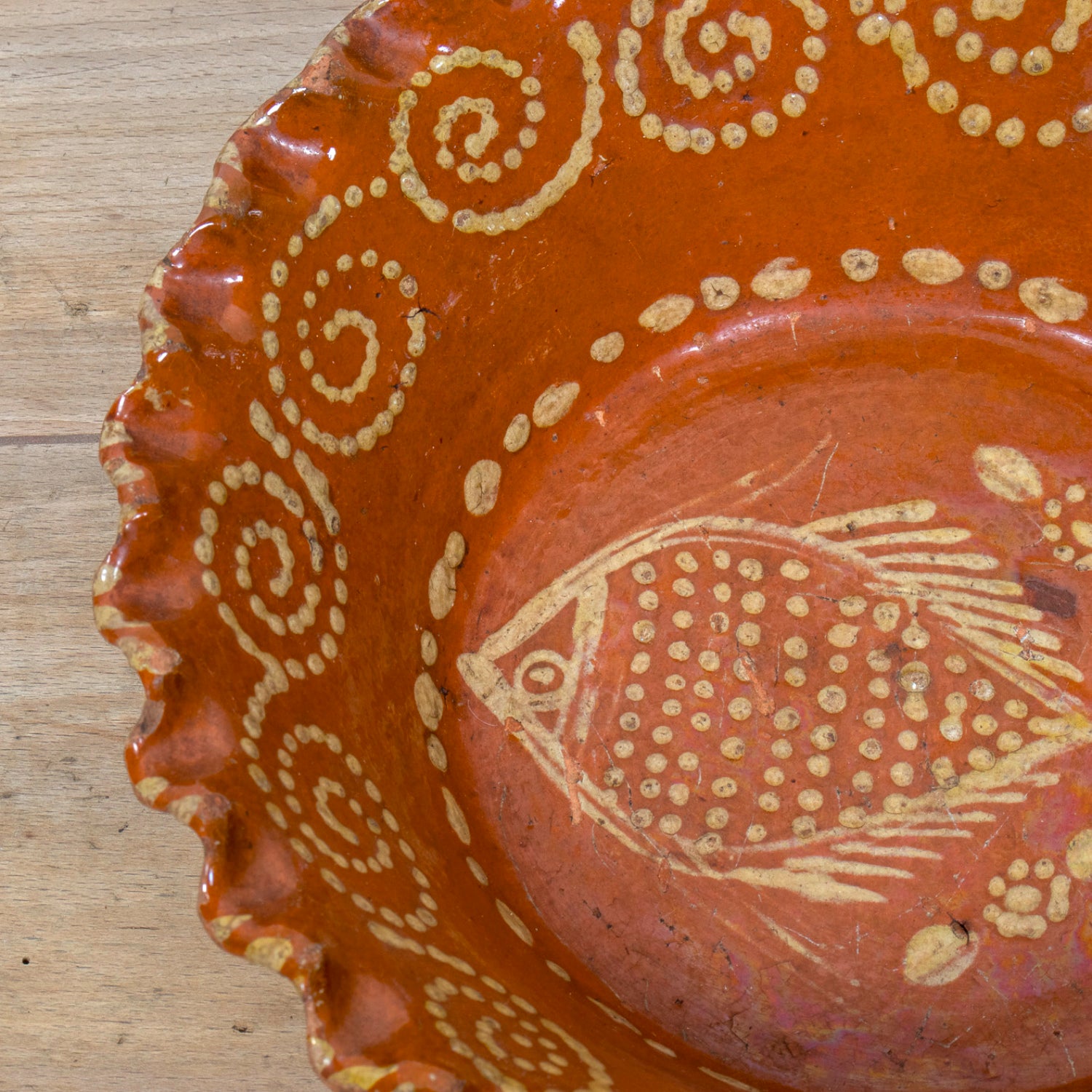 19th Century Portuguese Red Slipware Bowl with Fish Motif and Ruffled Rim