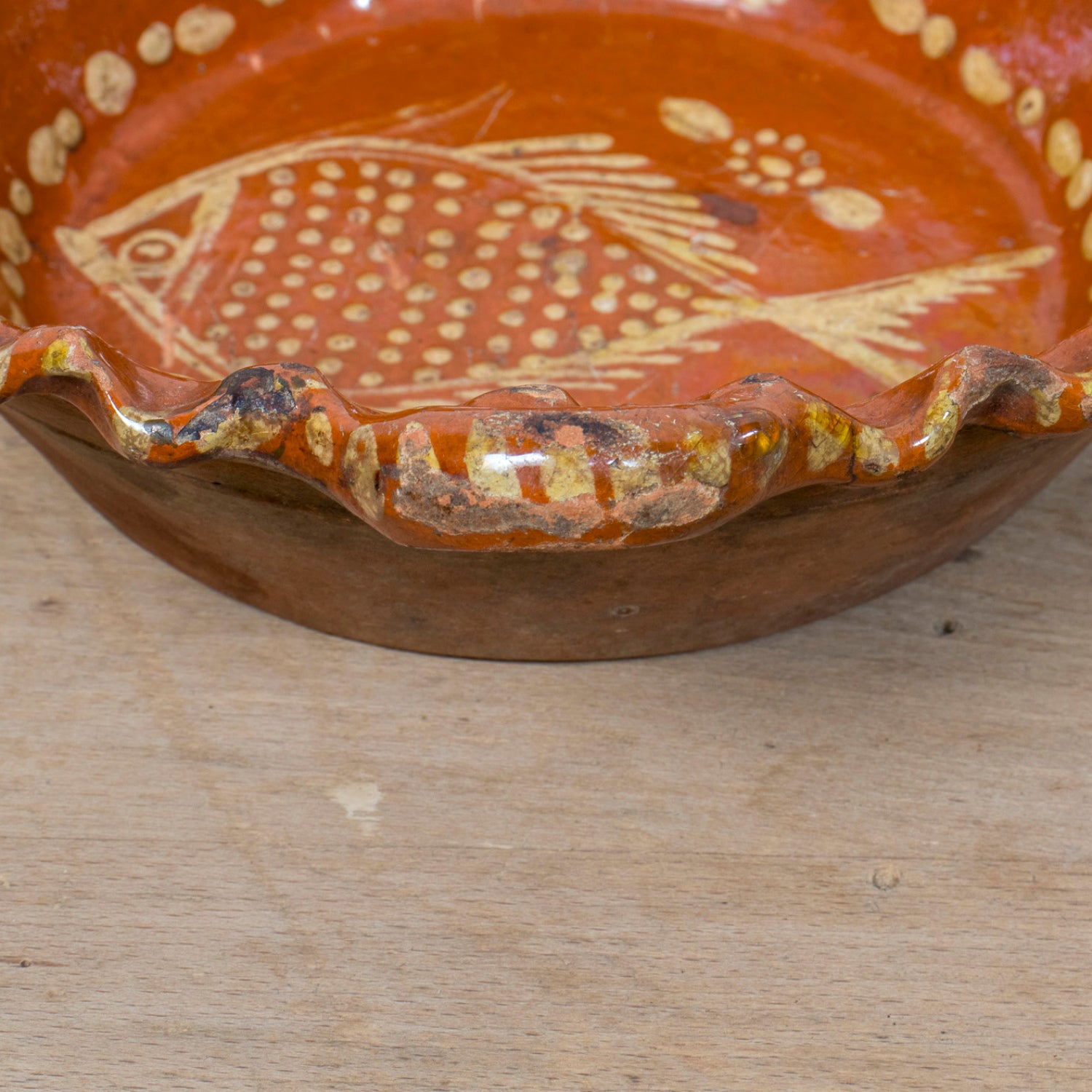 19th Century Portuguese Red Slipware Bowl with Fish Motif and Ruffled Rim
