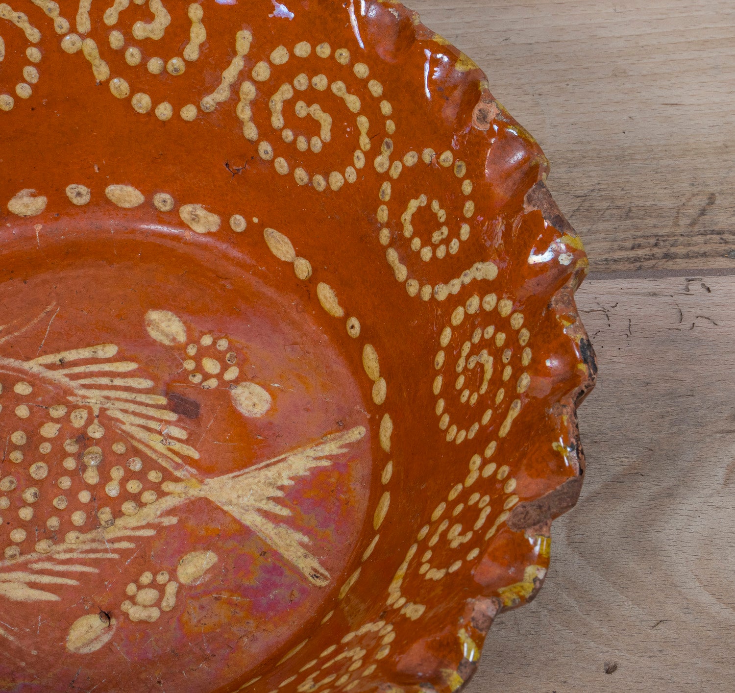 19th Century Portuguese Red Slipware Bowl with Fish Motif and Ruffled Rim