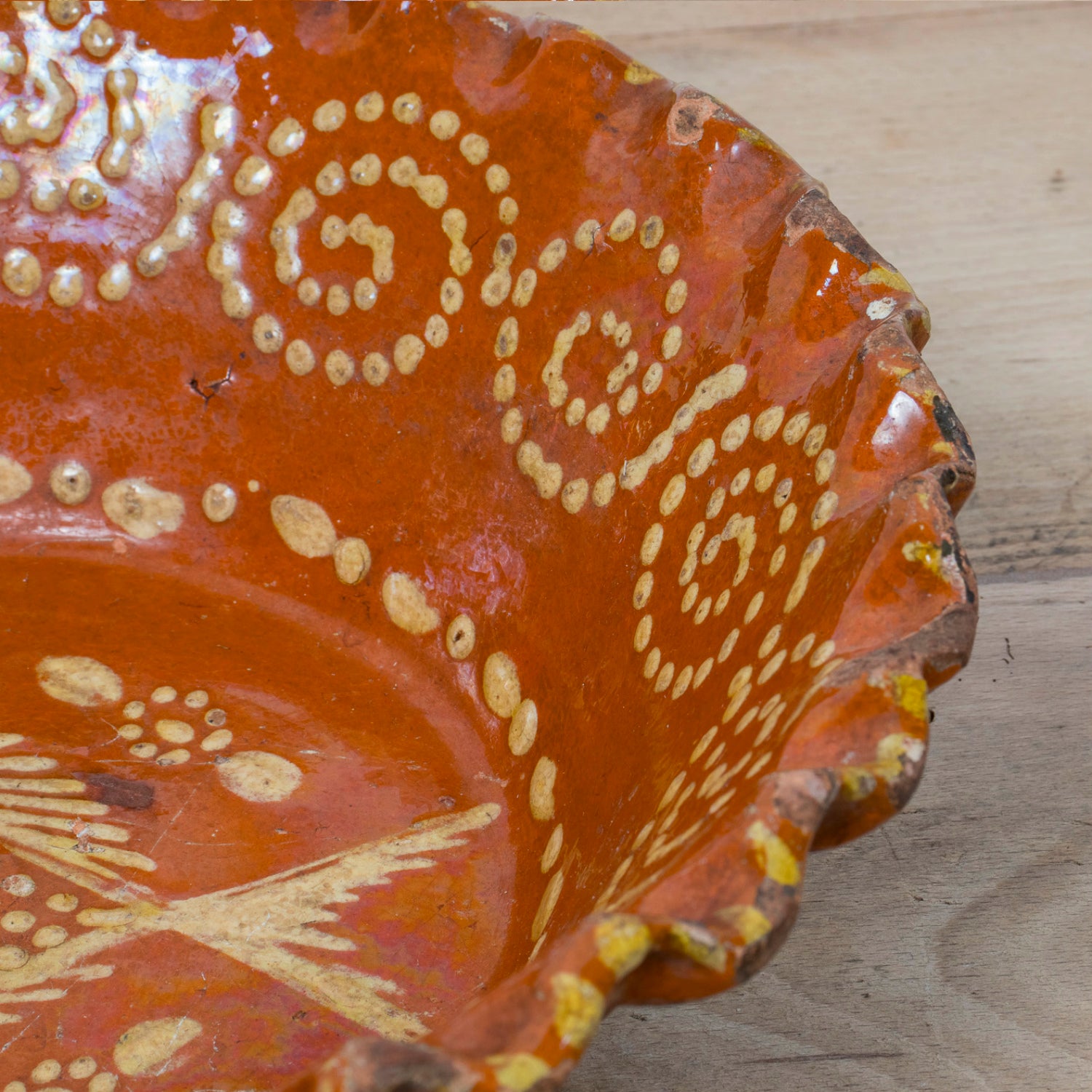 19th Century Portuguese Red Slipware Bowl with Fish Motif and Ruffled Rim