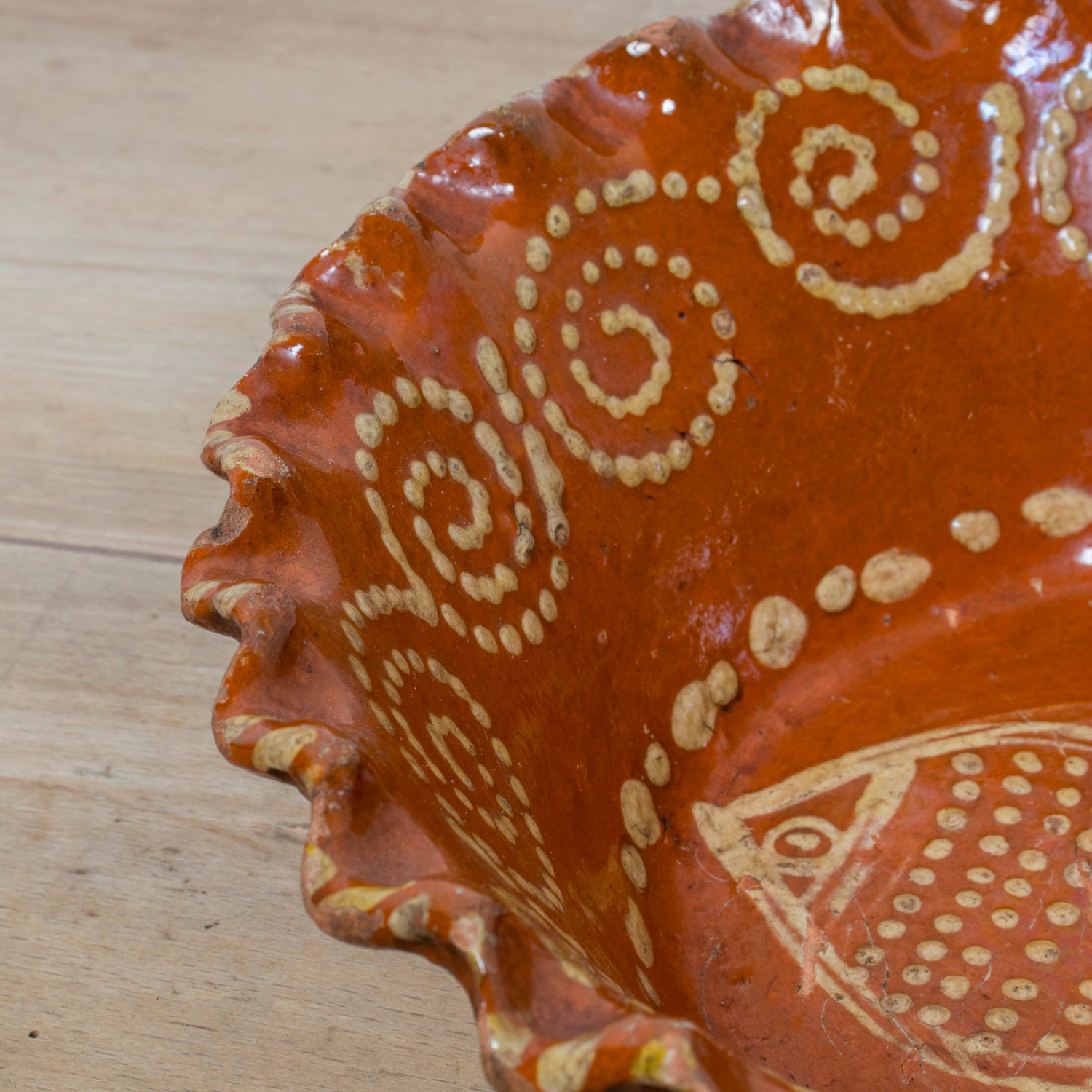 19th Century Portuguese Red Slipware Bowl with Fish Motif and Ruffled Rim