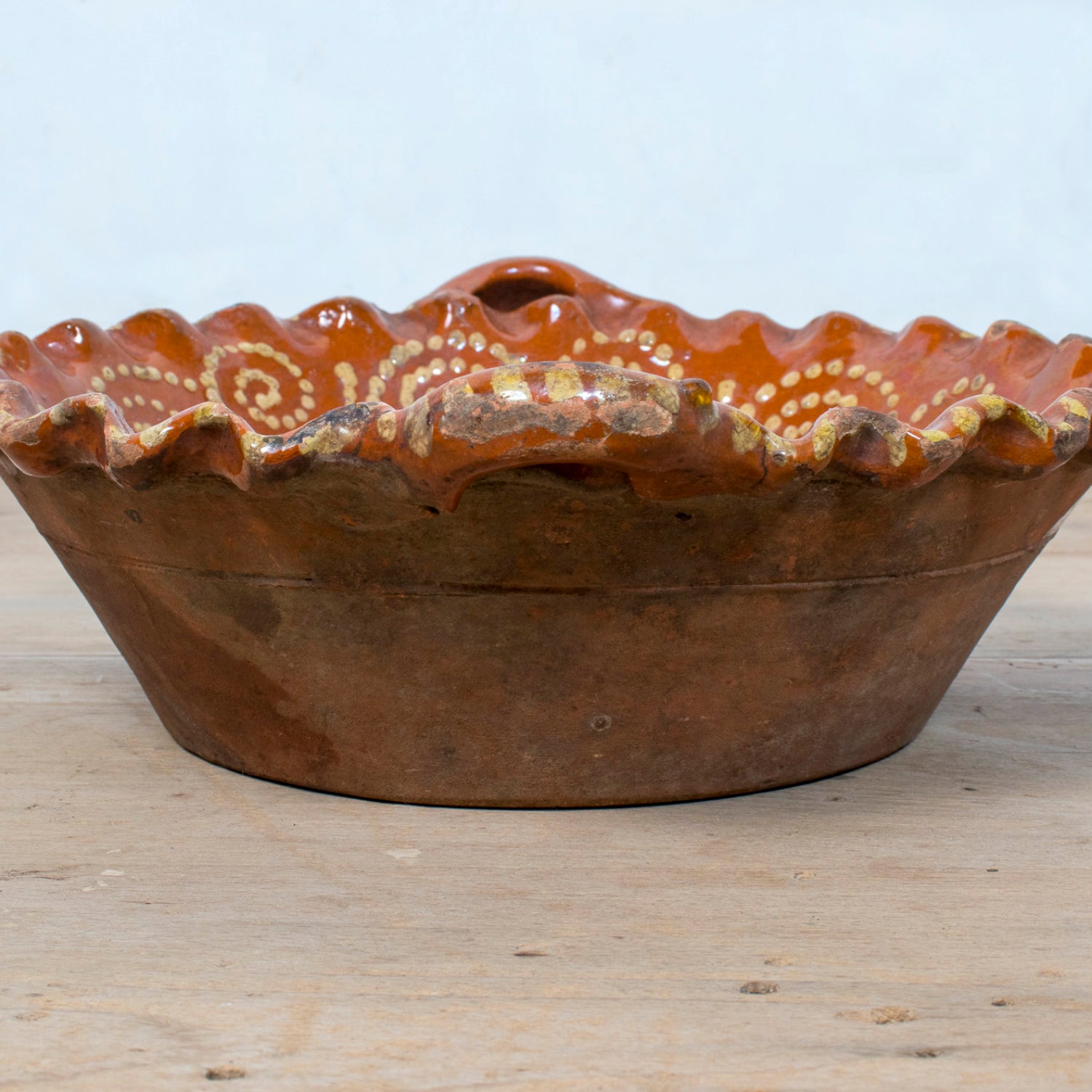 19th Century Portuguese Red Slipware Bowl with Fish Motif and Ruffled Rim