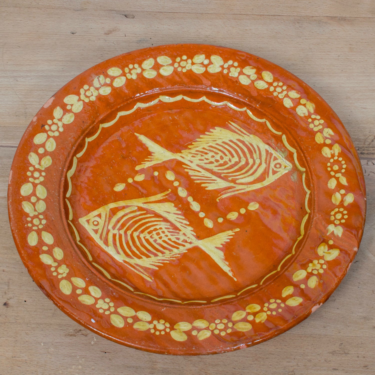 19th Century Round Portuguese Red Slipware Serving Platter with Fish Motif
