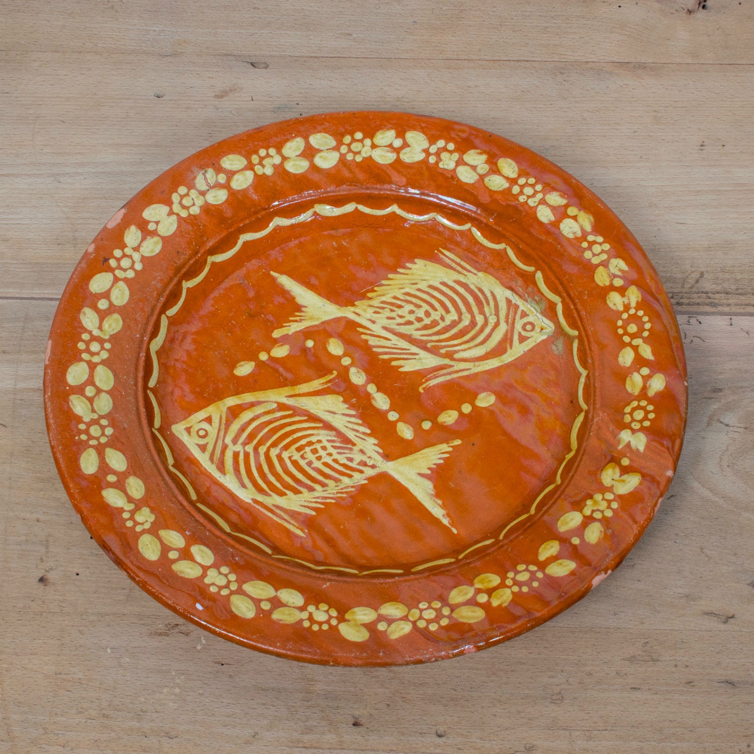 19th Century Round Portuguese Red Slipware Serving Platter with Fish Motif