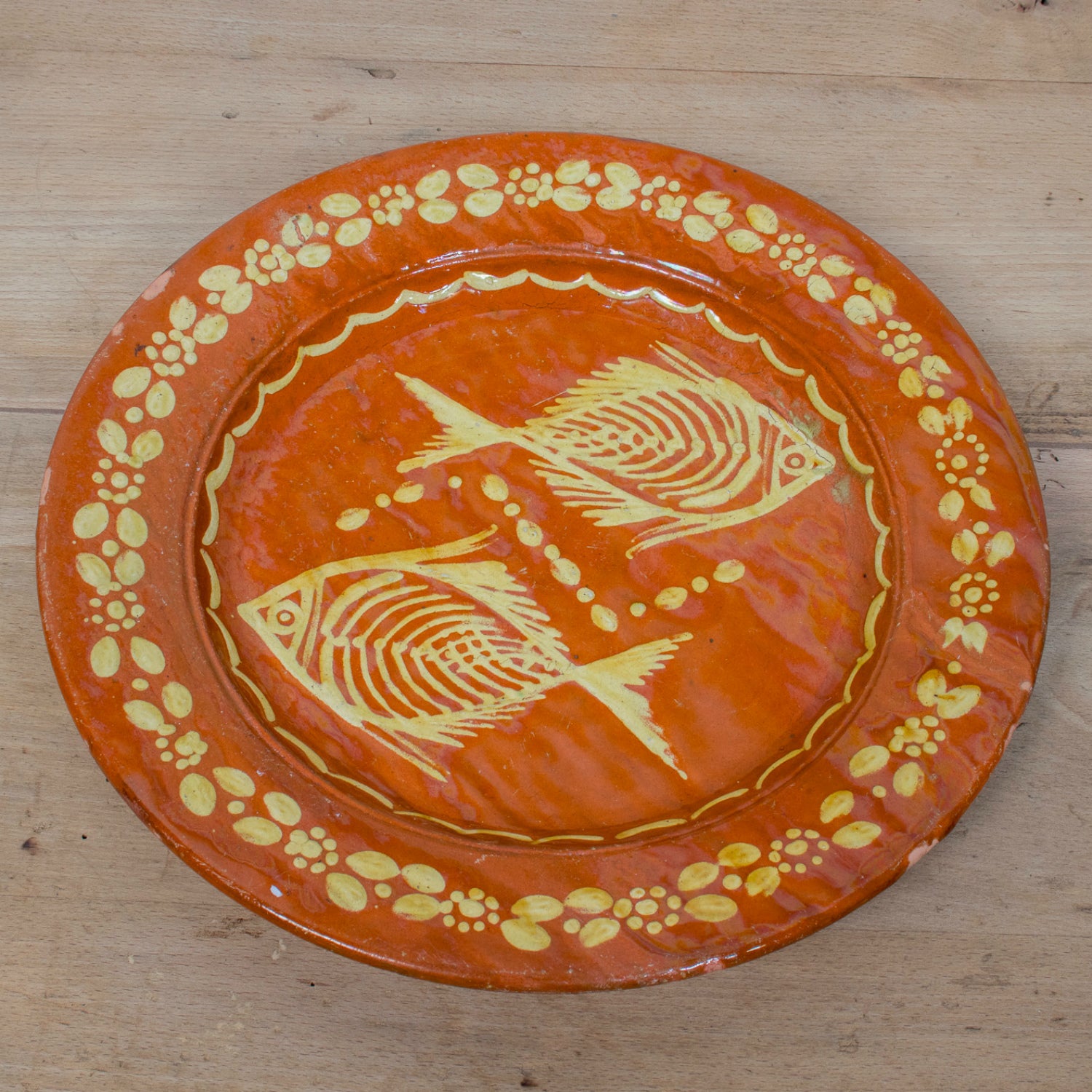 19th Century Round Portuguese Red Slipware Serving Platter with Fish Motif