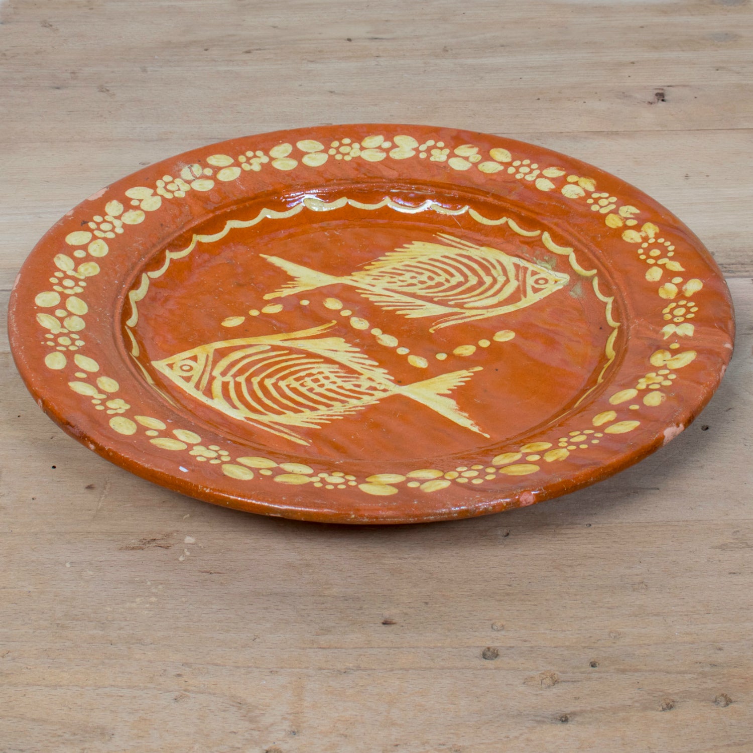19th Century Round Portuguese Red Slipware Serving Platter with Fish Motif