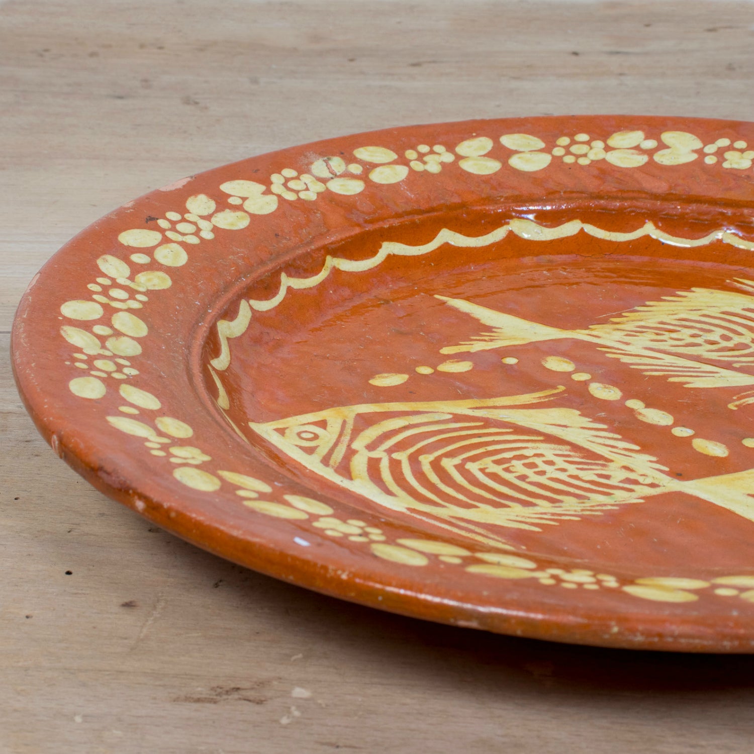 19th Century Round Portuguese Red Slipware Serving Platter with Fish Motif